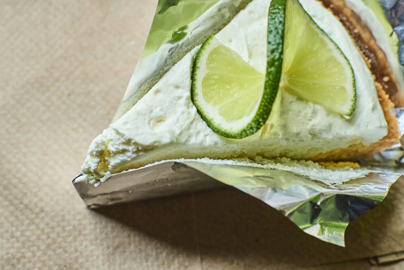 Key lime dessert slice with fresh lime