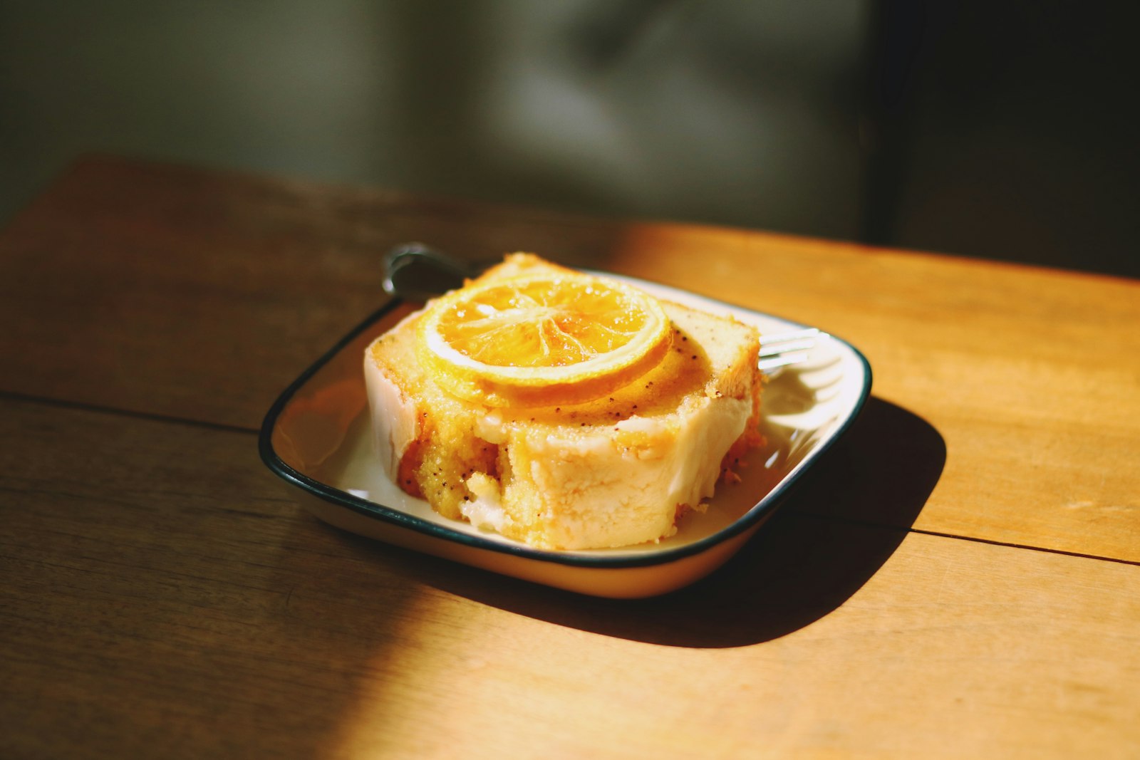 Lemon sponge cake with an orange slice