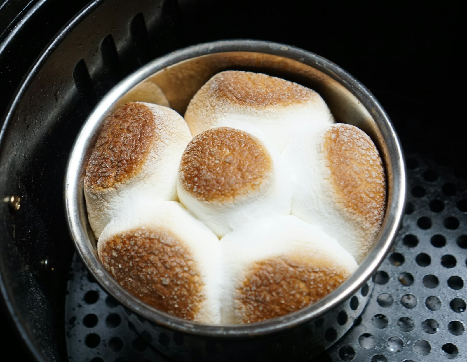 Toasted homemade marshmallows in a pan