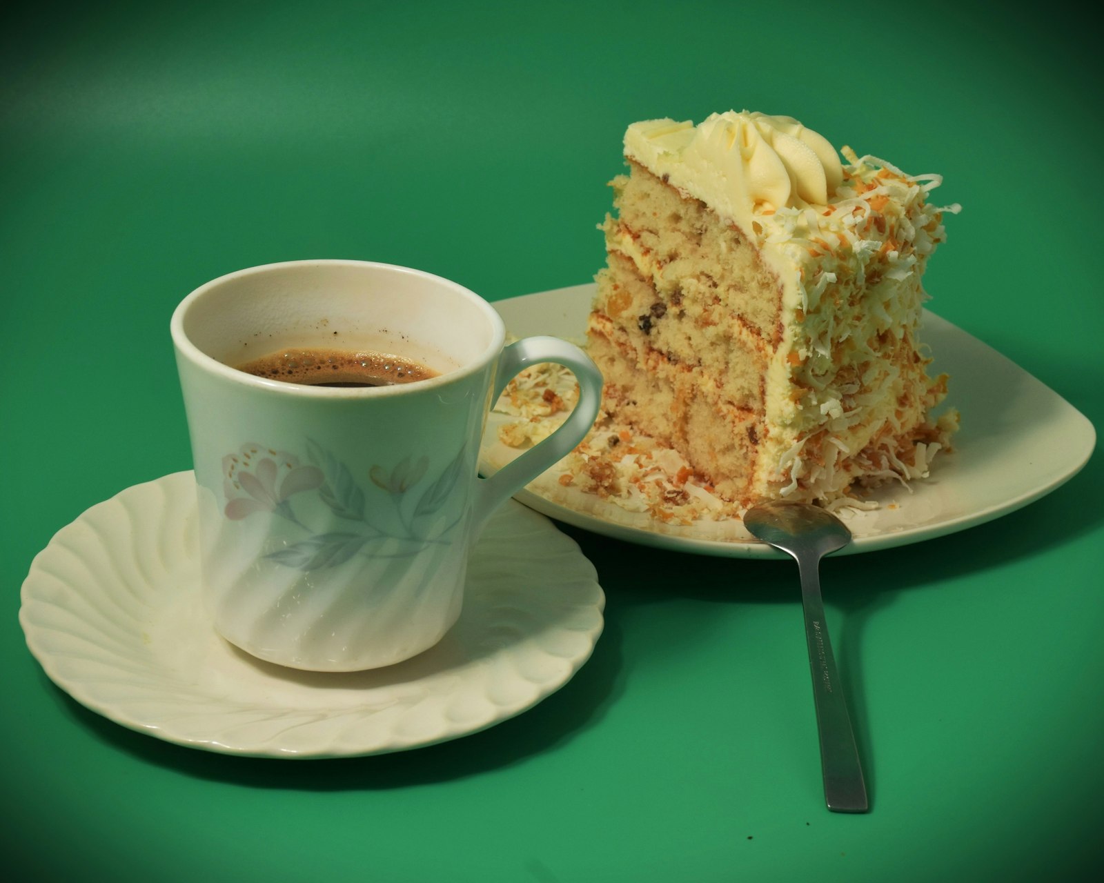 Carrot cake slice with a cup of tea