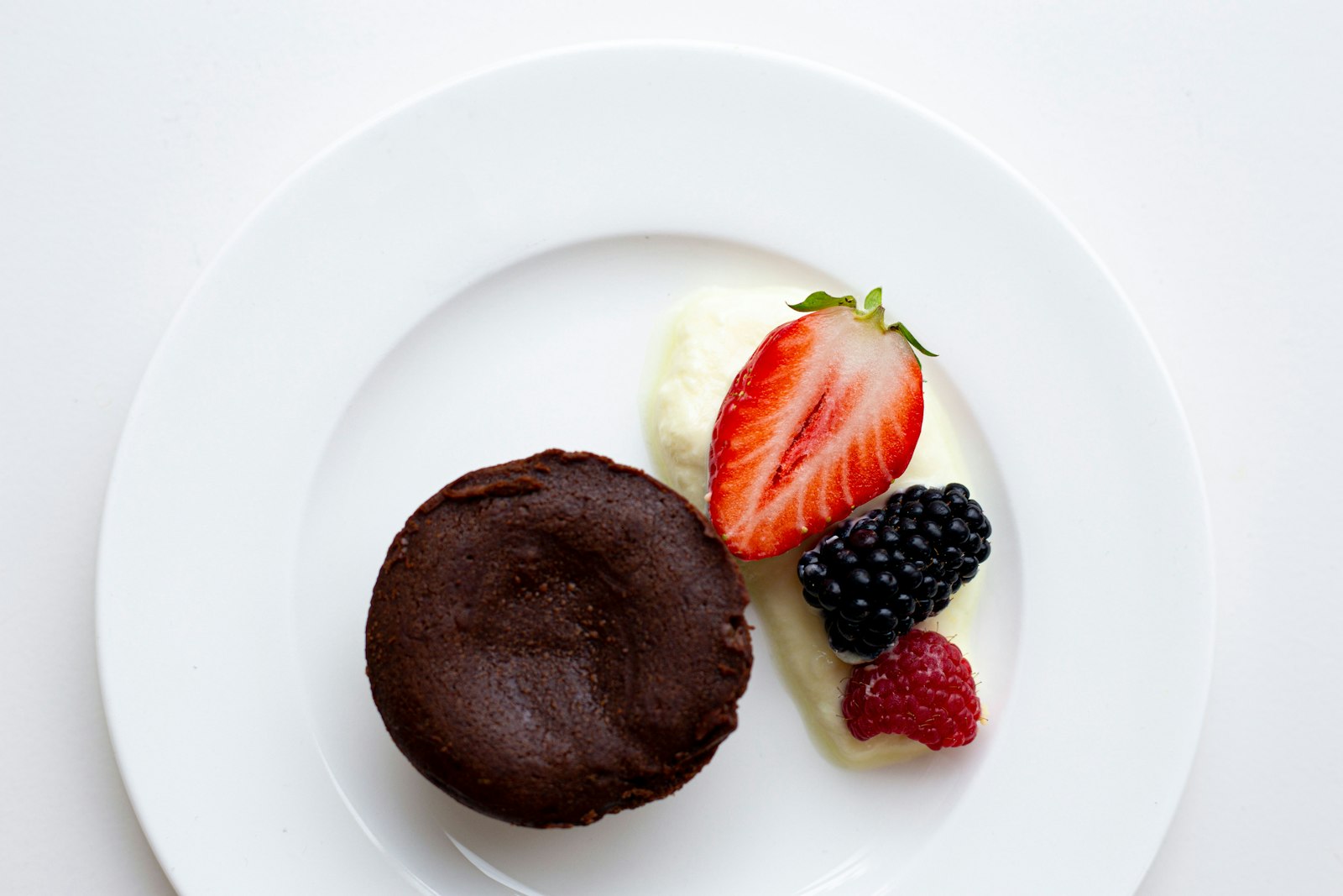 Molten chocolate lava cake with berries