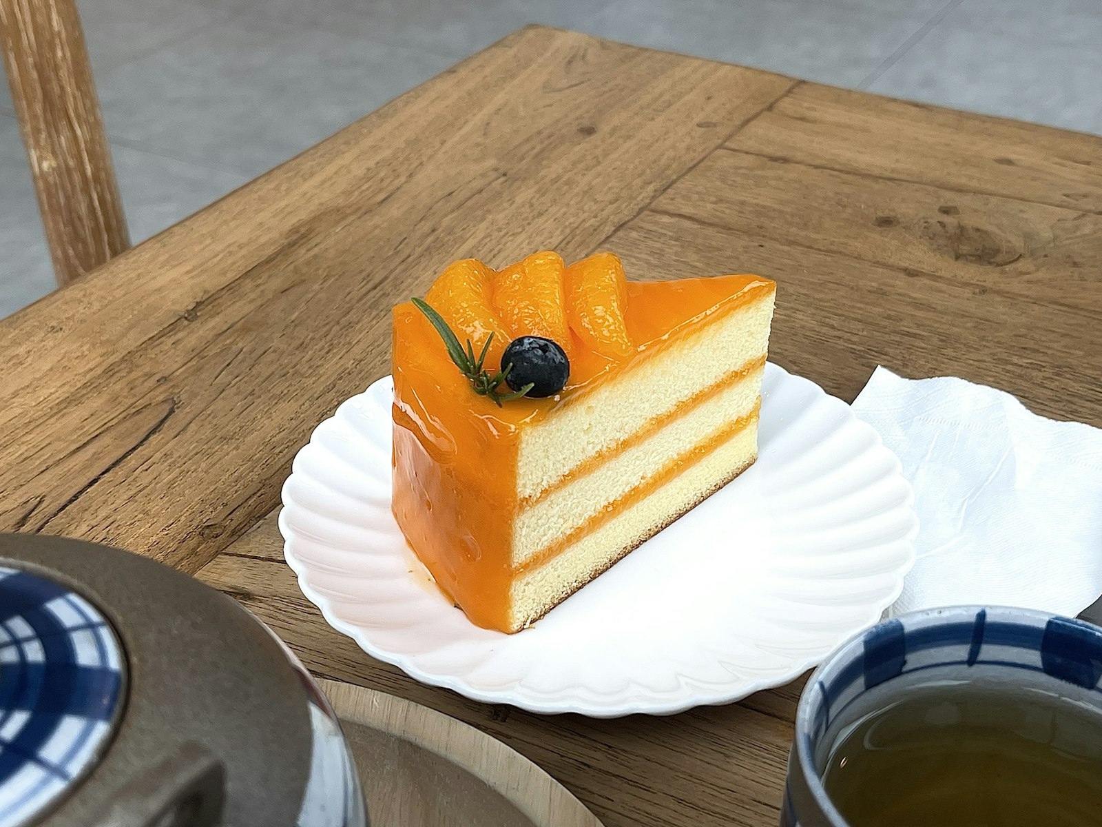 Slice of orange layer cake, one of the best citrus desserts