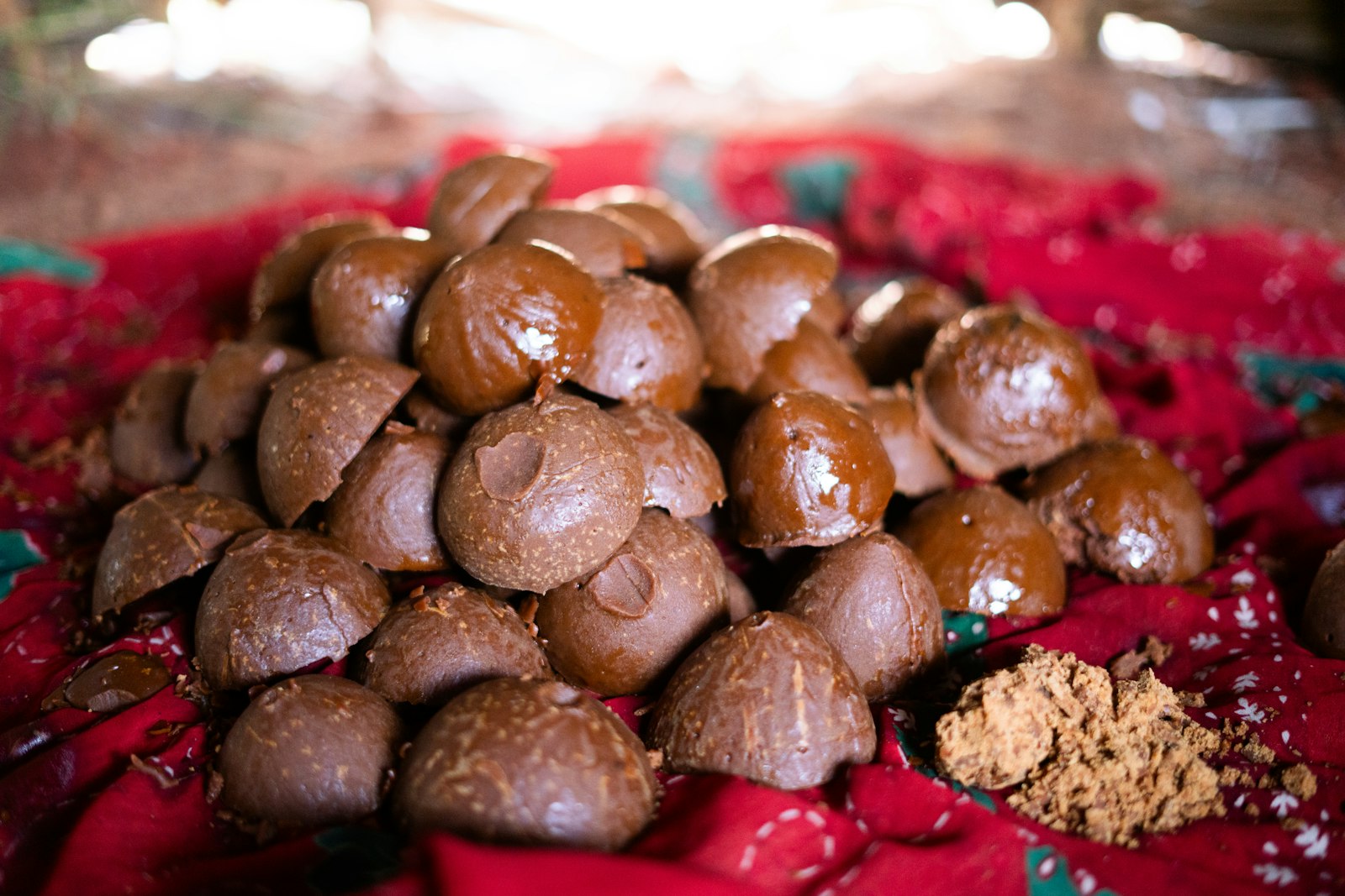Chocolate dipped candy balls on a plate