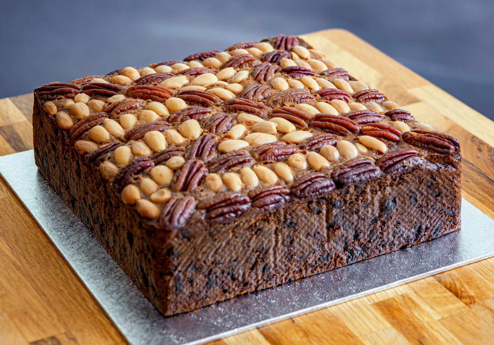 Pecan topped chocolate bake in a square pan