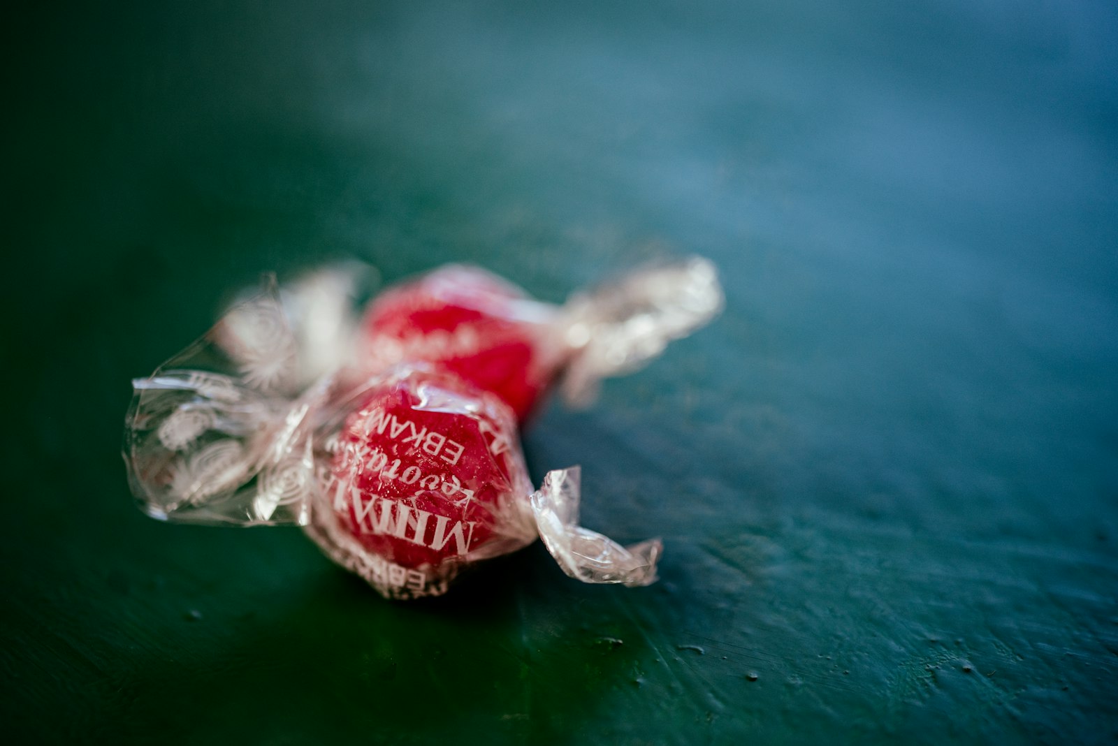 Wrapped red and white mint candy