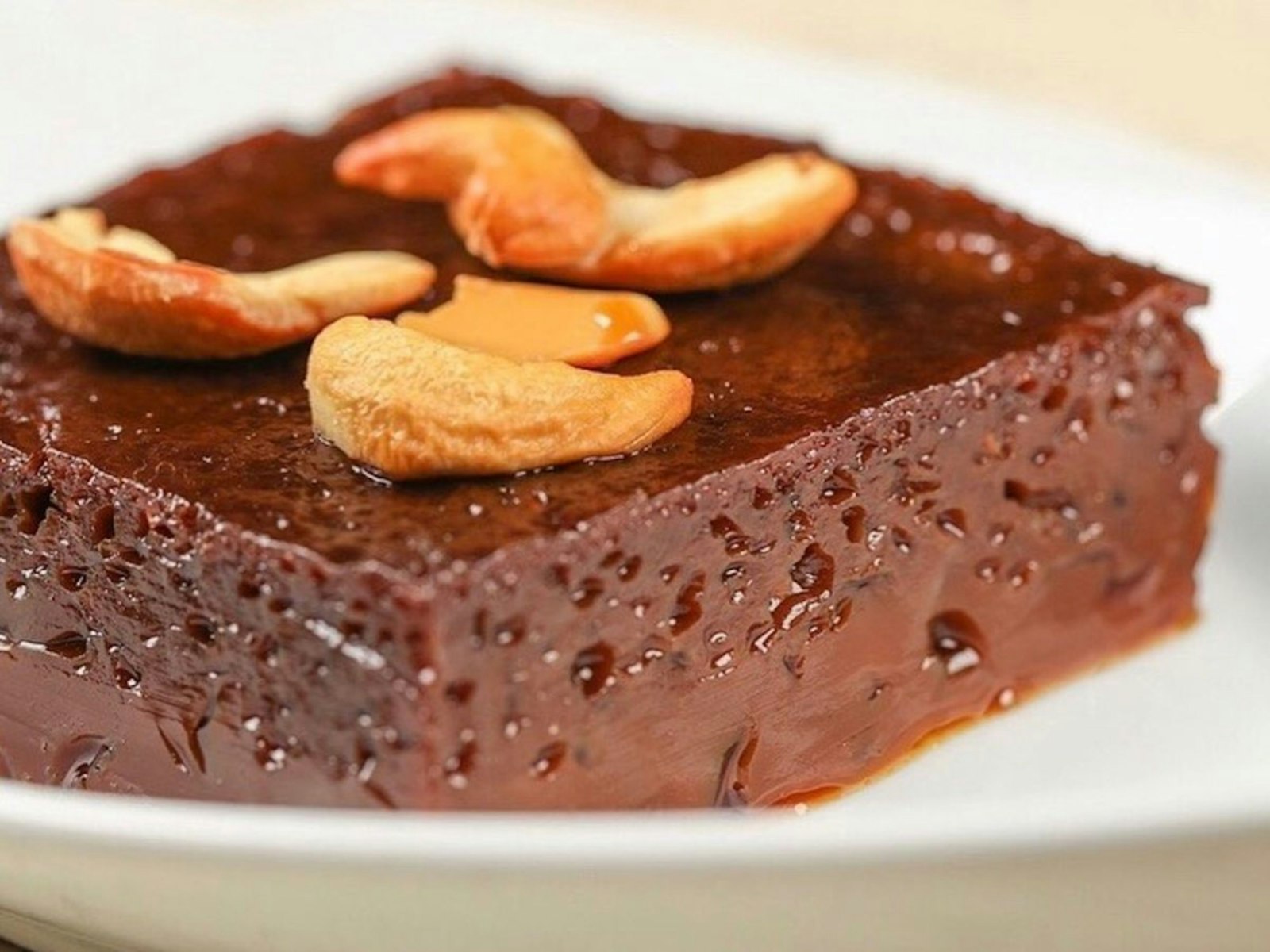 Caramel squares topped with nuts