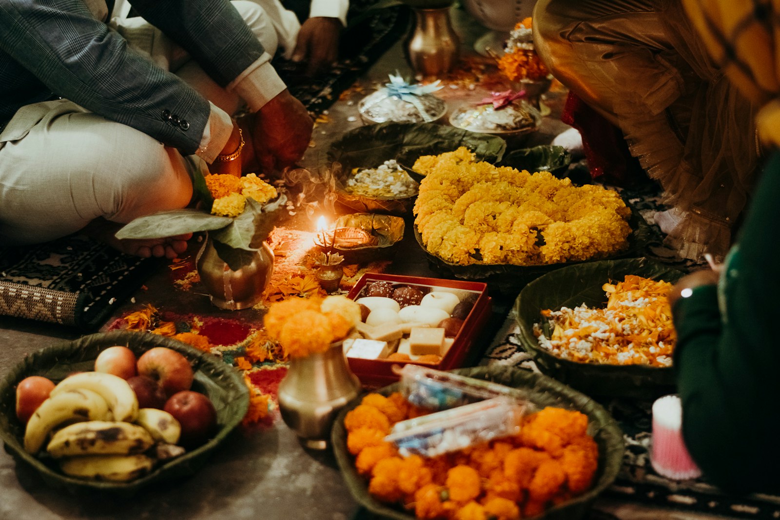 Mithai platter decorated with marigold flowers