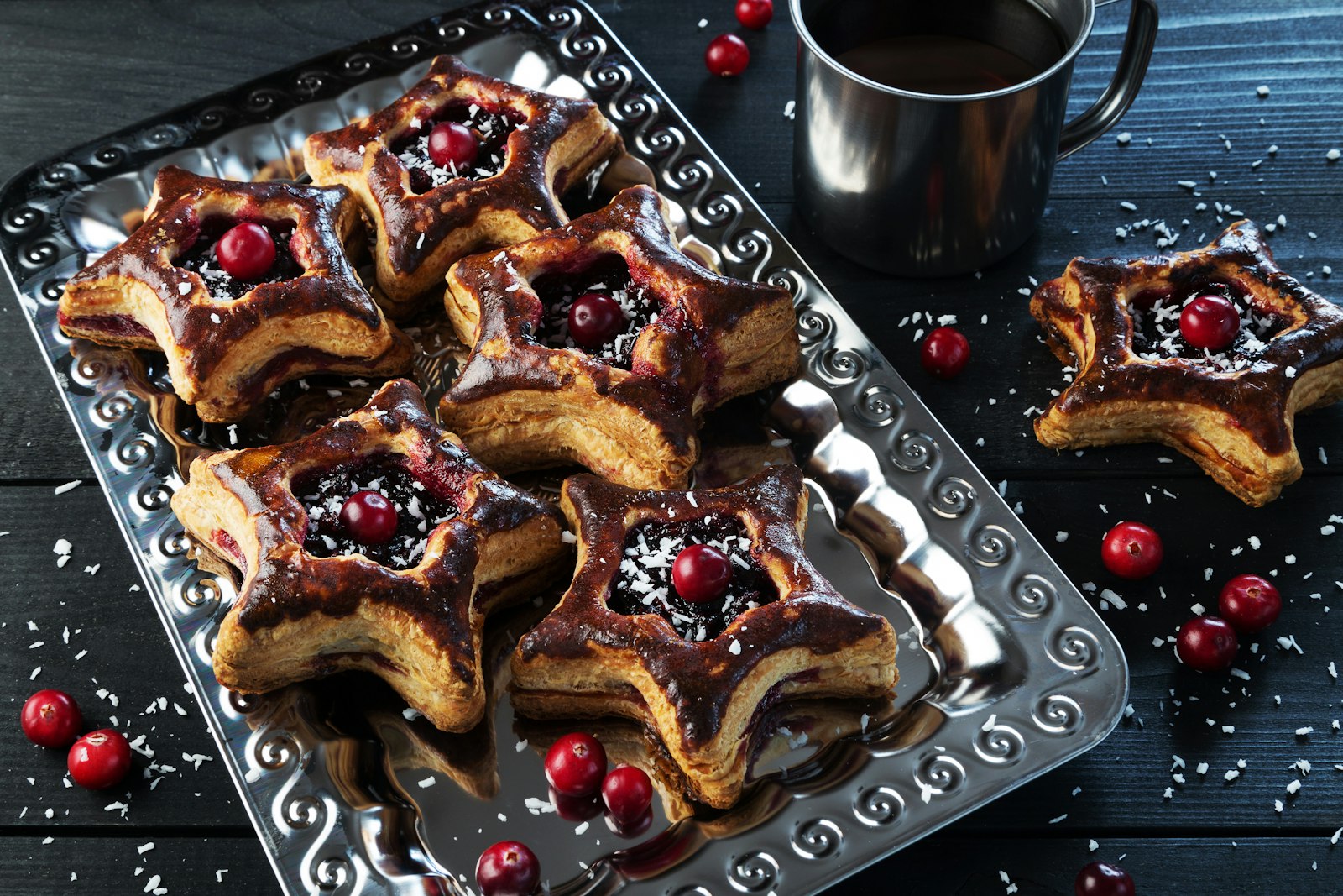 Cherry jam pastry stars on a silver tray