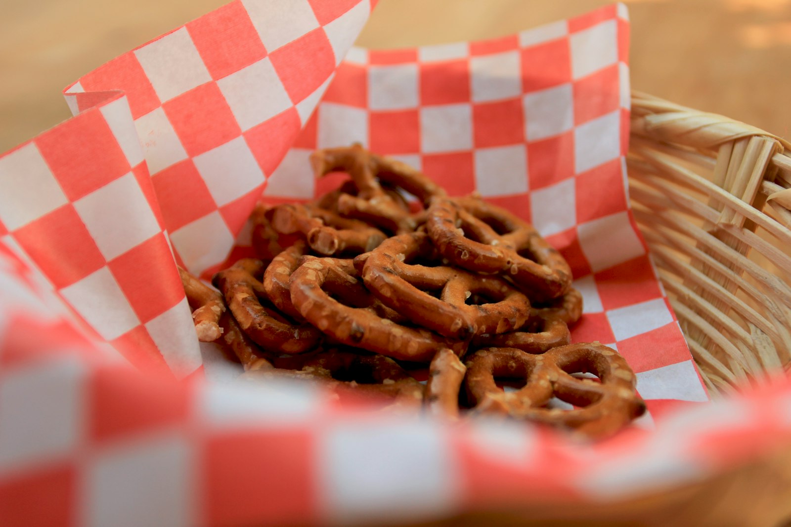 Basket of pretzel bites on a checkered cloth