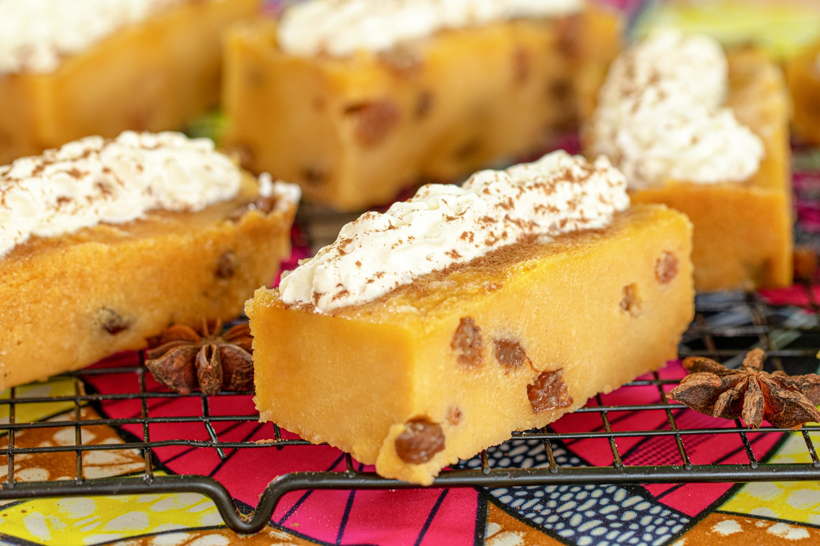 Pumpkin pie bars topped with whipped cream