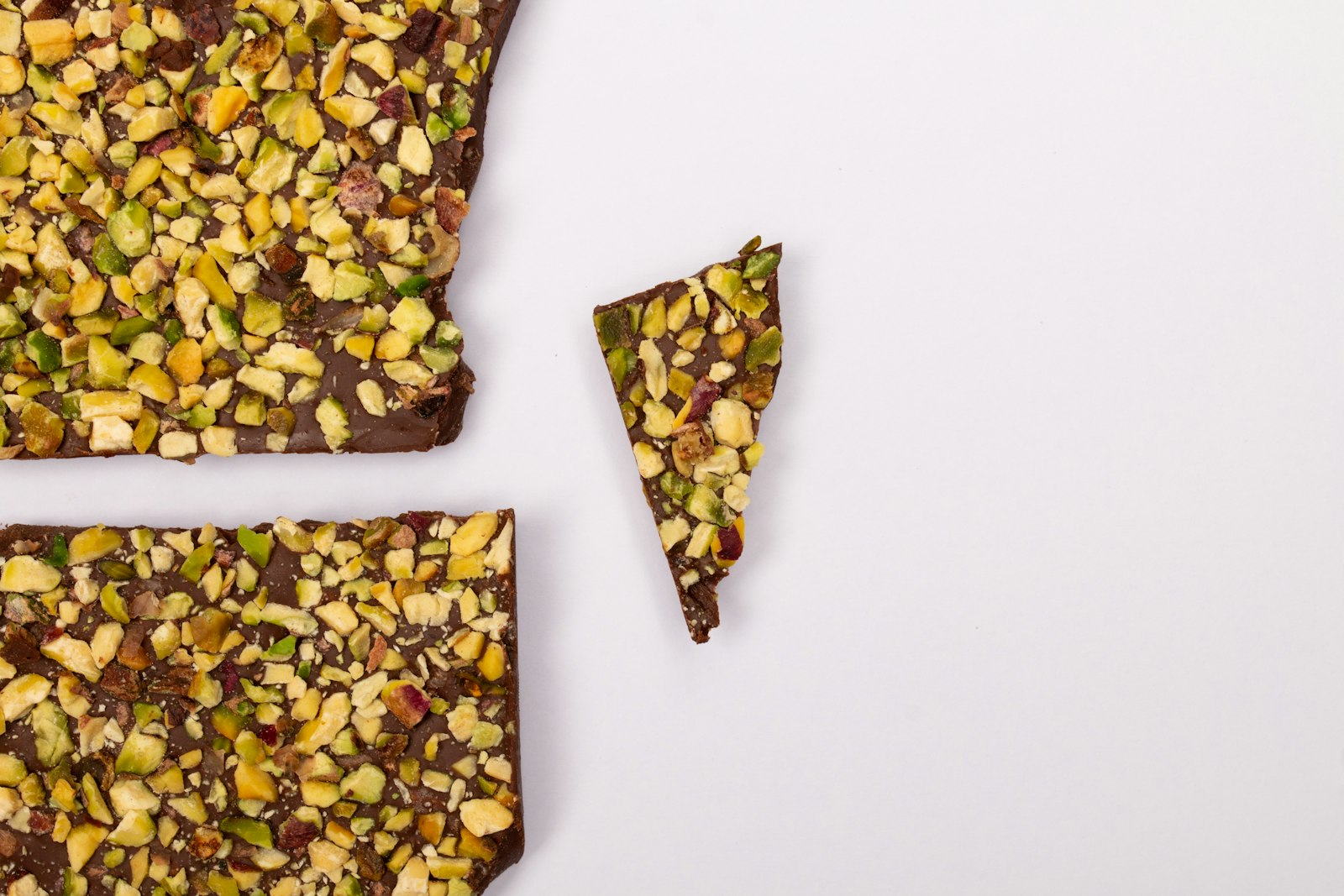 Chocolate bark made with leftover Halloween candy and nuts