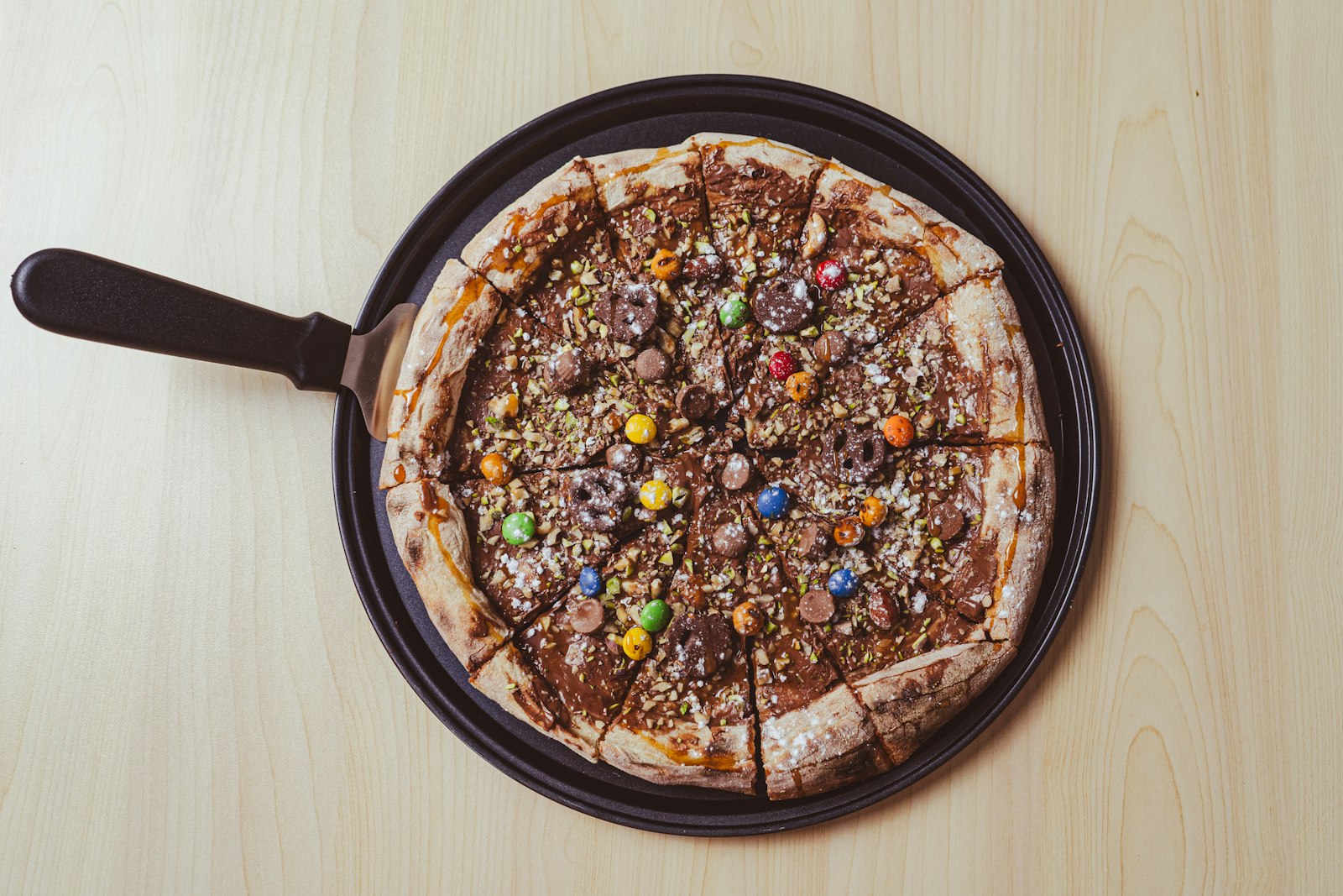 Cookie pizza topped with leftover Halloween candy