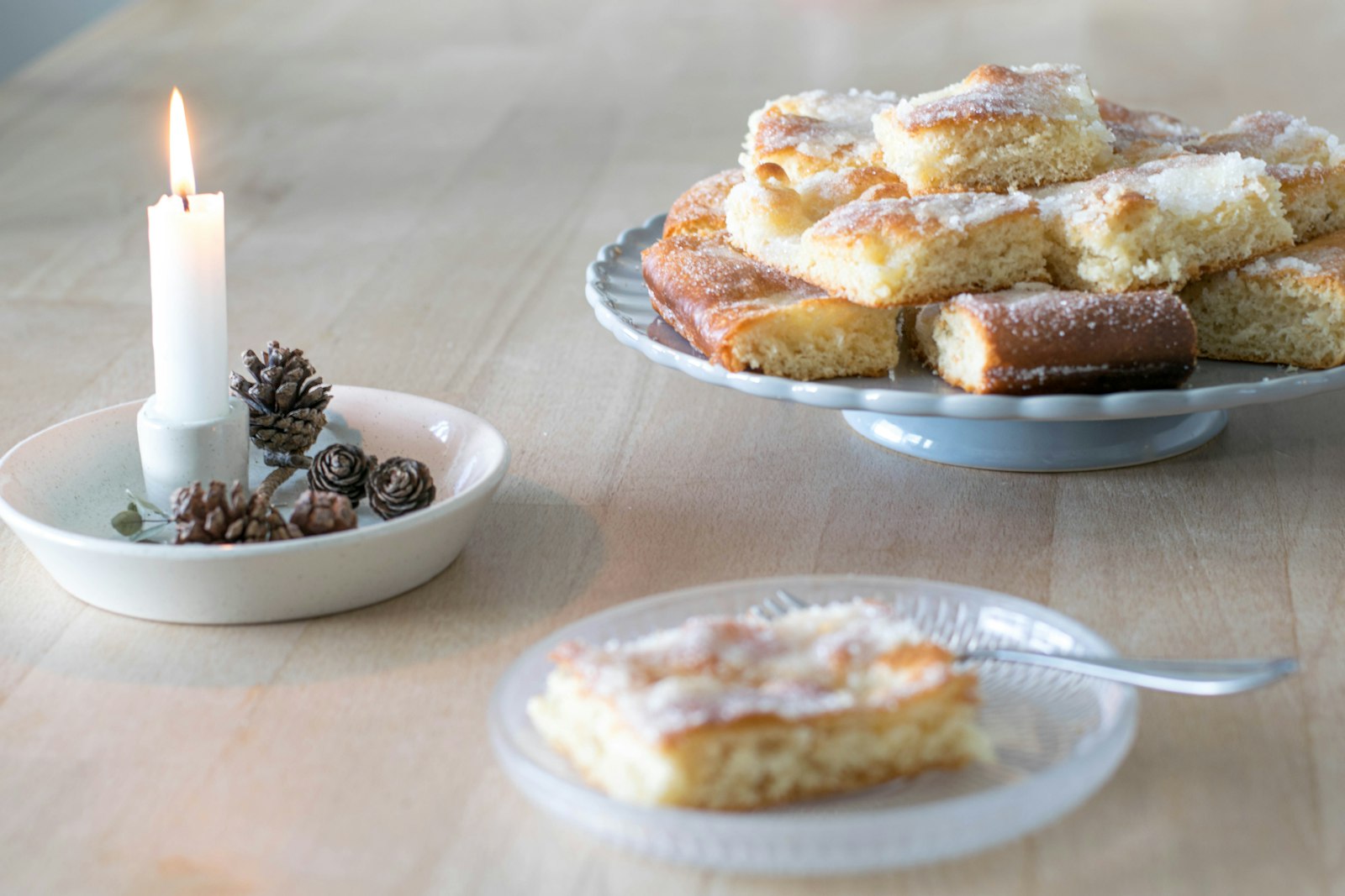 Gooey butter cake mix squares dusted with sugar