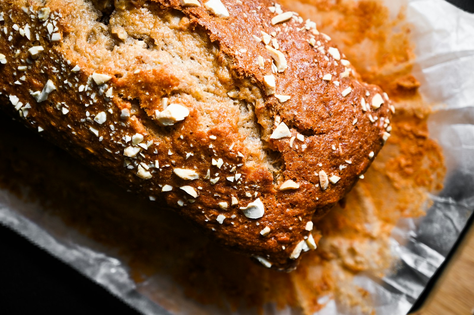 Golden loaf of quick bread on a board
