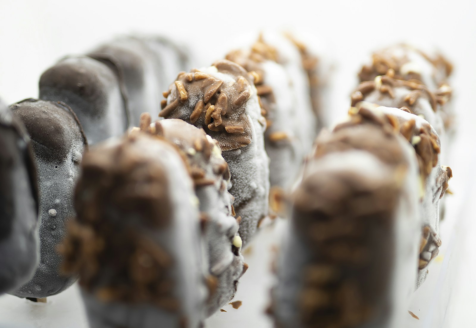 Chocolate dipped frozen banana pops