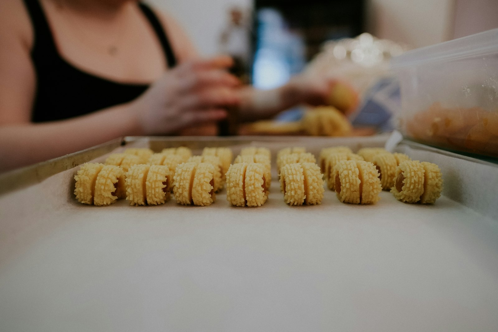 Shaping twisted koulourakia butter cookies, classic Greek desserts for Easter