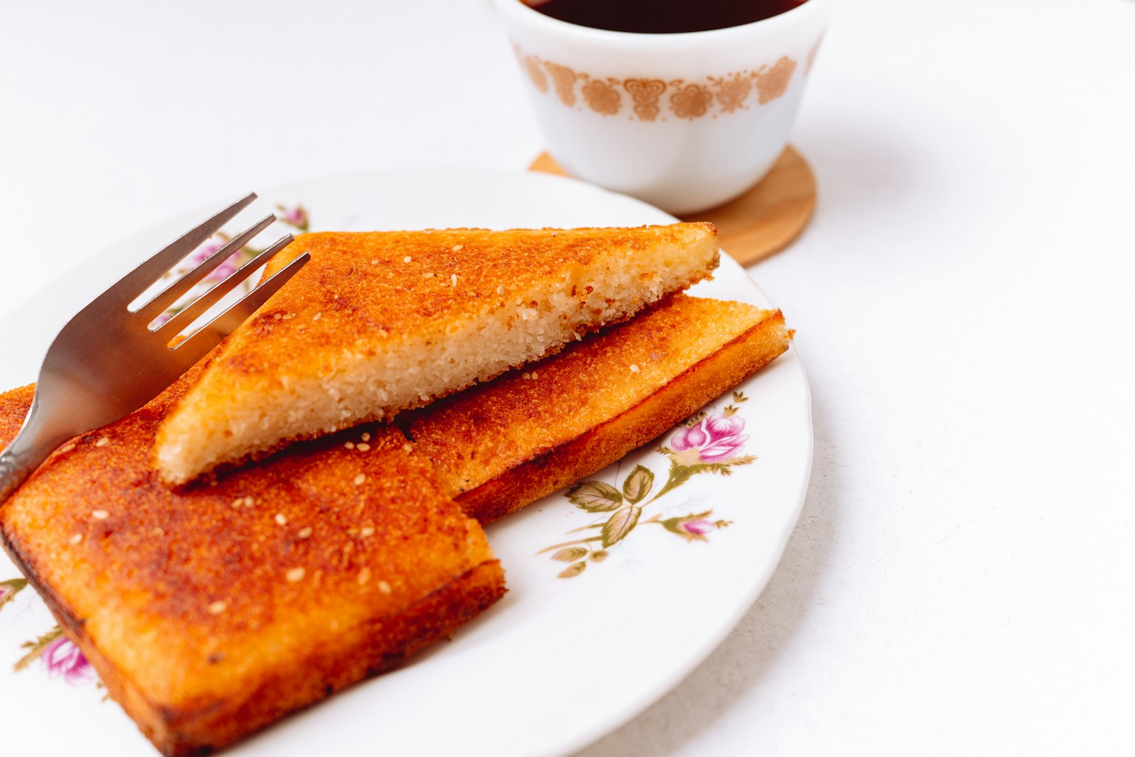 Syrup soaked semolina cake slices on a plate