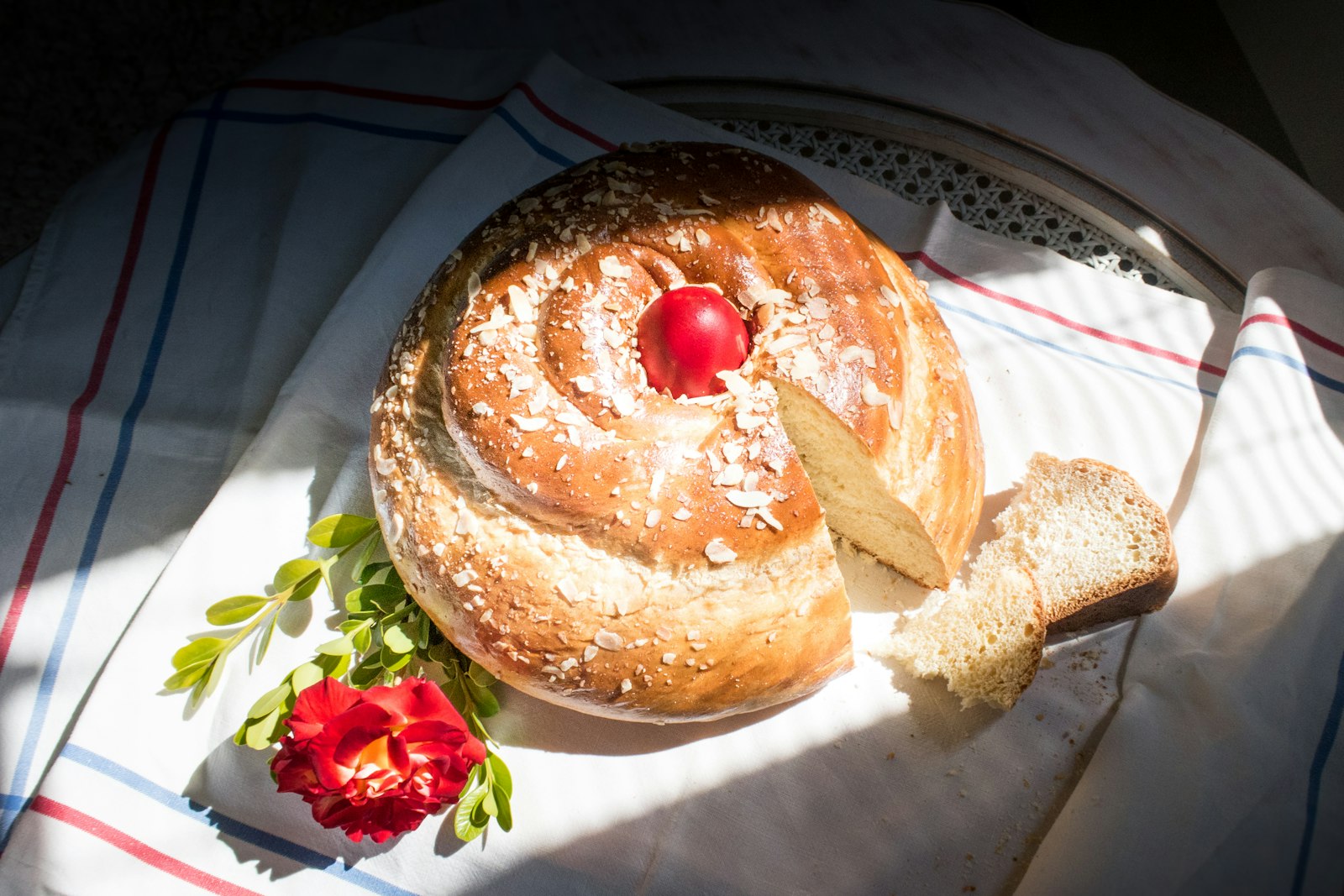 Braided Easter sweet bread with red eggs