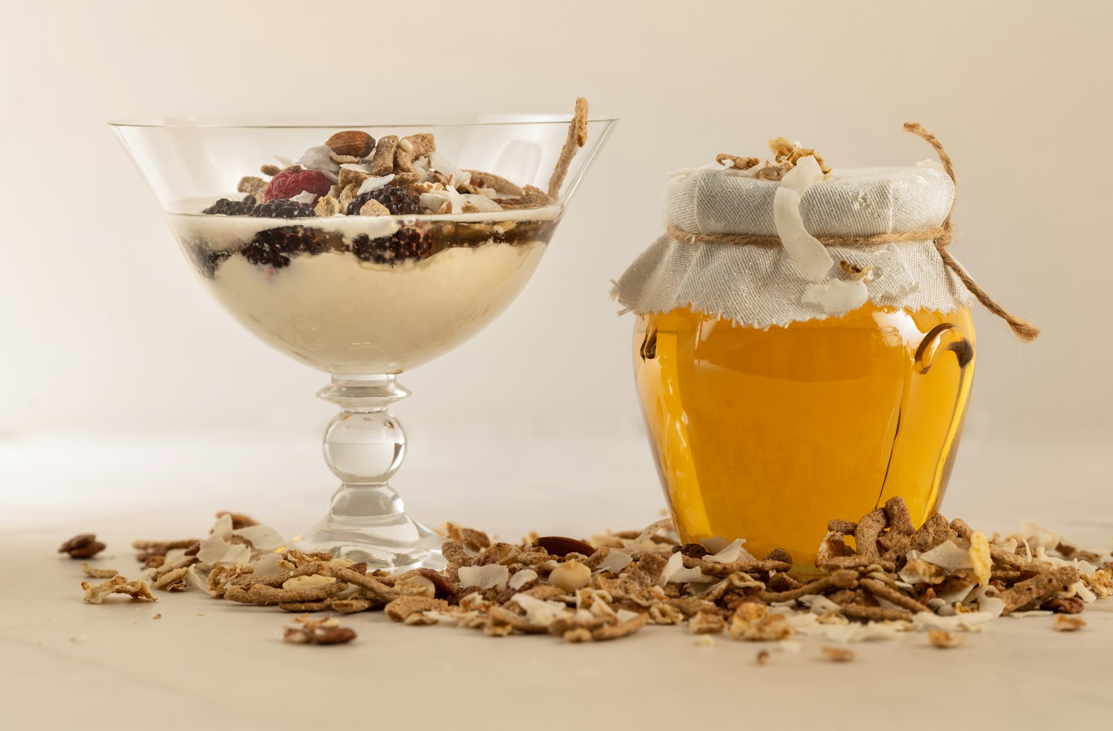 Greek yogurt with honey and walnuts in a glass