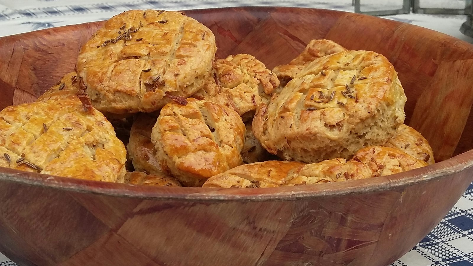 Cheddar biscuits in a rustic bowl