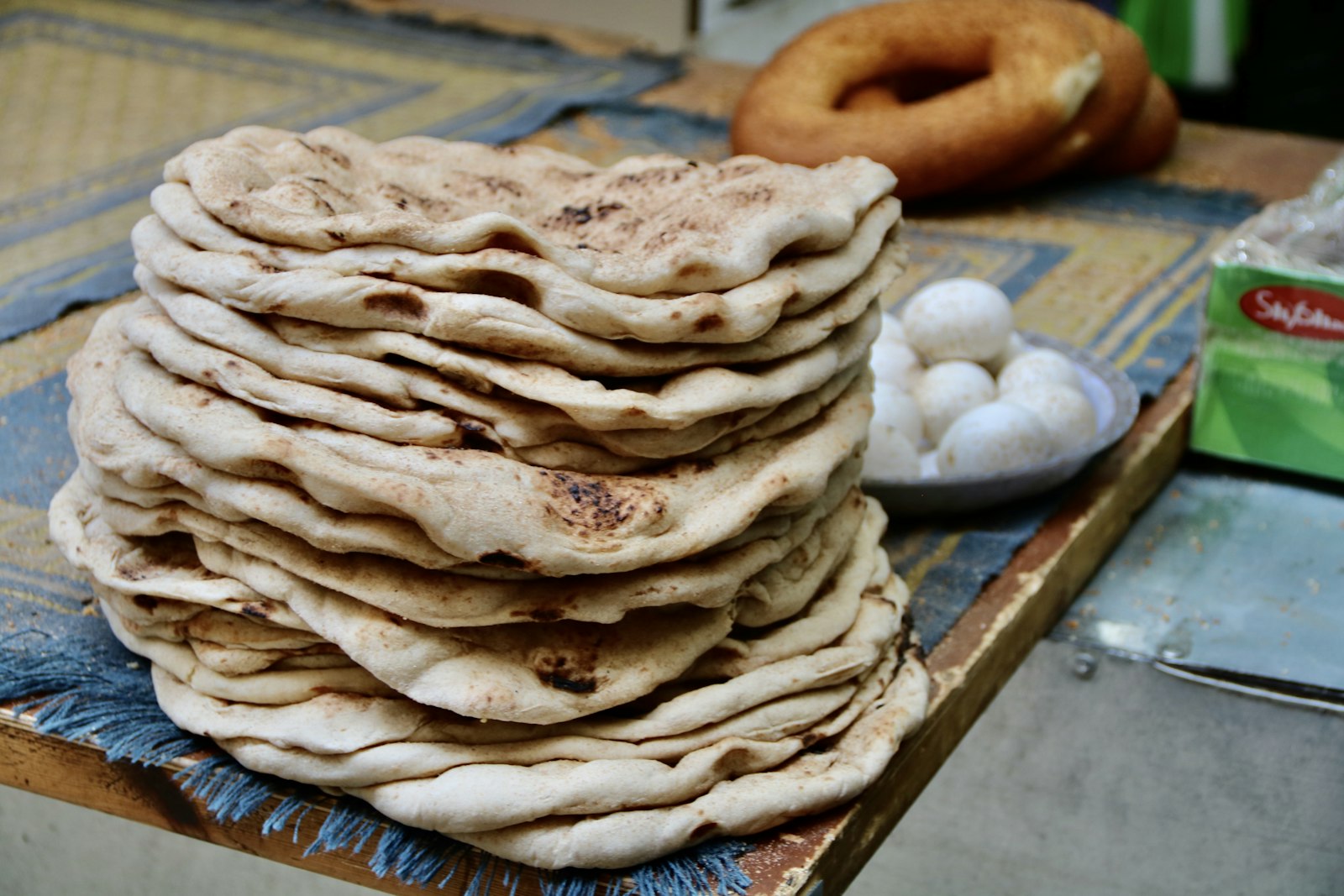 Stack of thin lavash flatbread with eggs