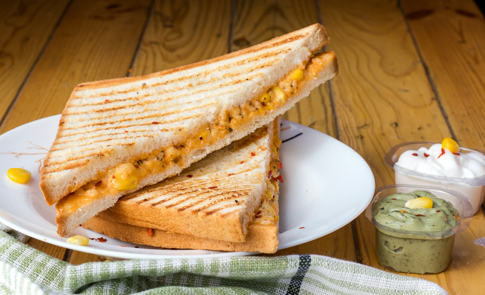 Pressed panini breakfast sandwiches with grill marks