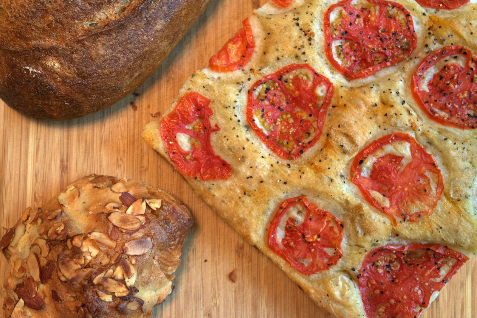 Sourdough recipes focaccia topped with sliced tomatoes