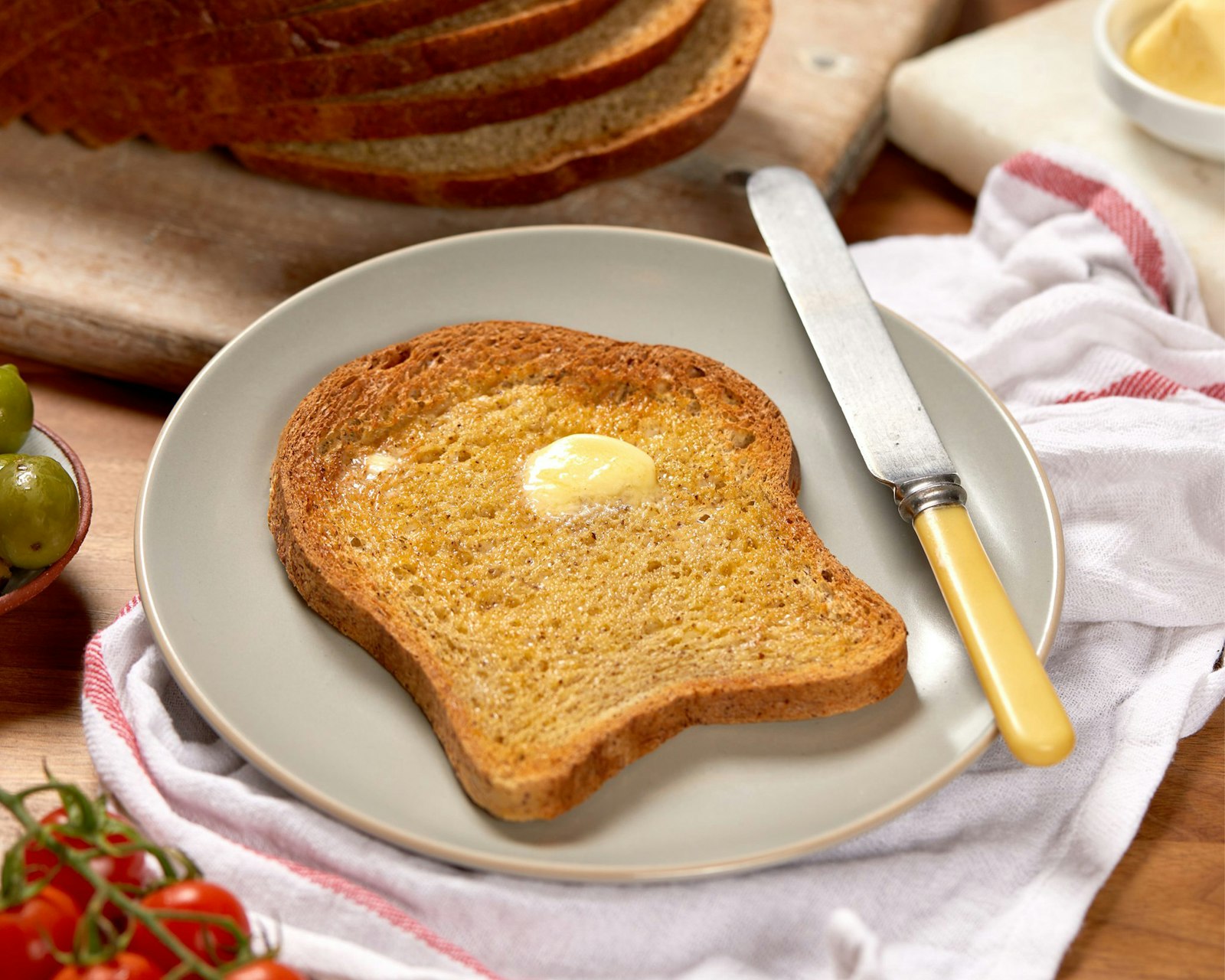 Buttered toast slice on a small plate