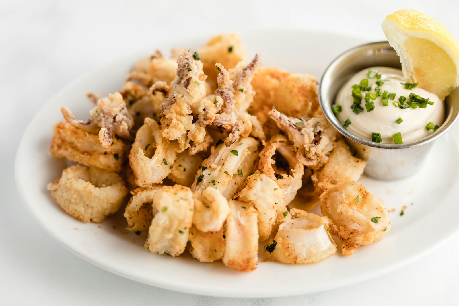 Fried calamari with lemon, a Christmas Eve dinner classic in Italy