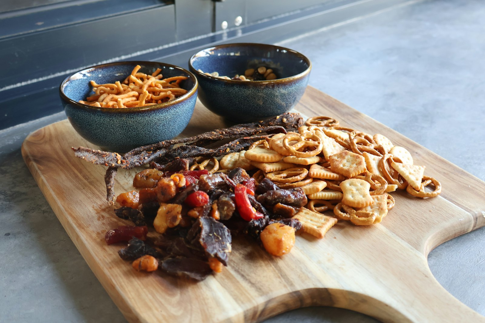 Retro appetizers: homemade party mix on a board