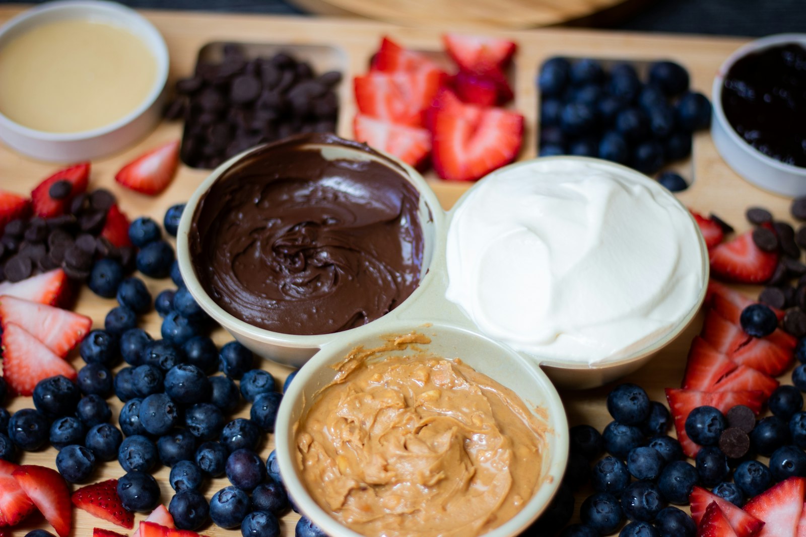 Chocolate fondue party with berries and dips