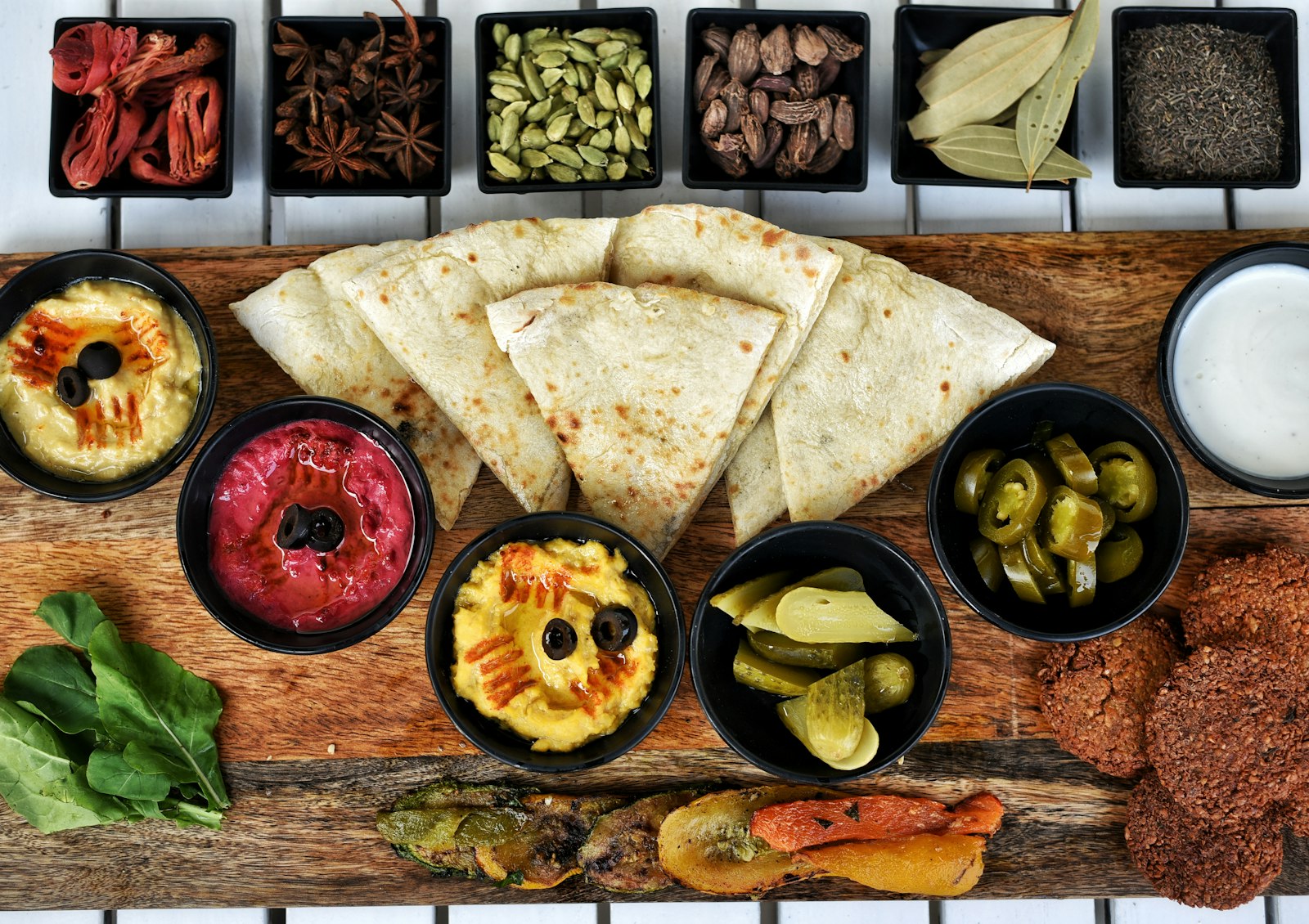 Mezze board with hummus, dips, olives and flatbread