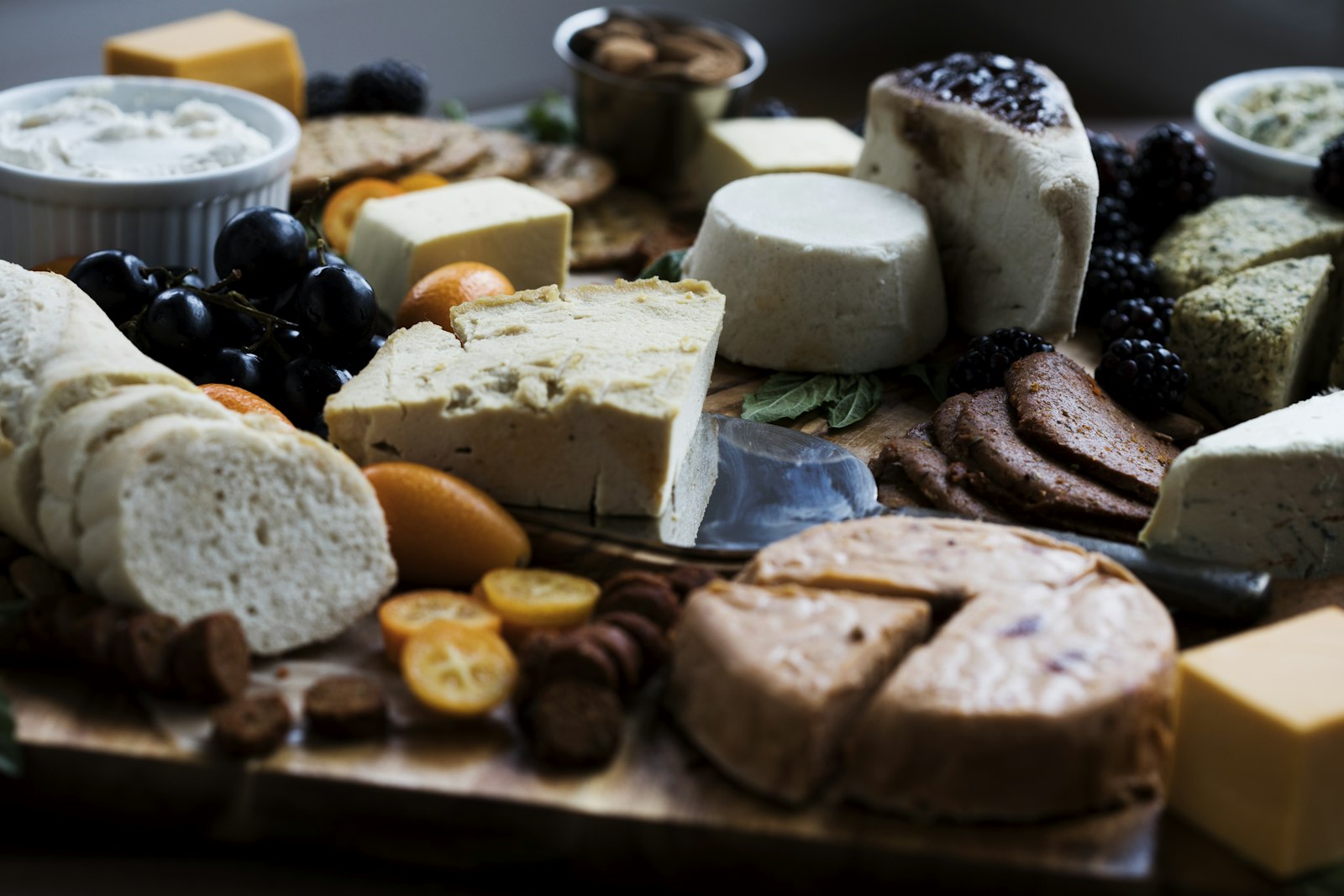 Cheese board ideas with crusty bread, aged cheese and sausage