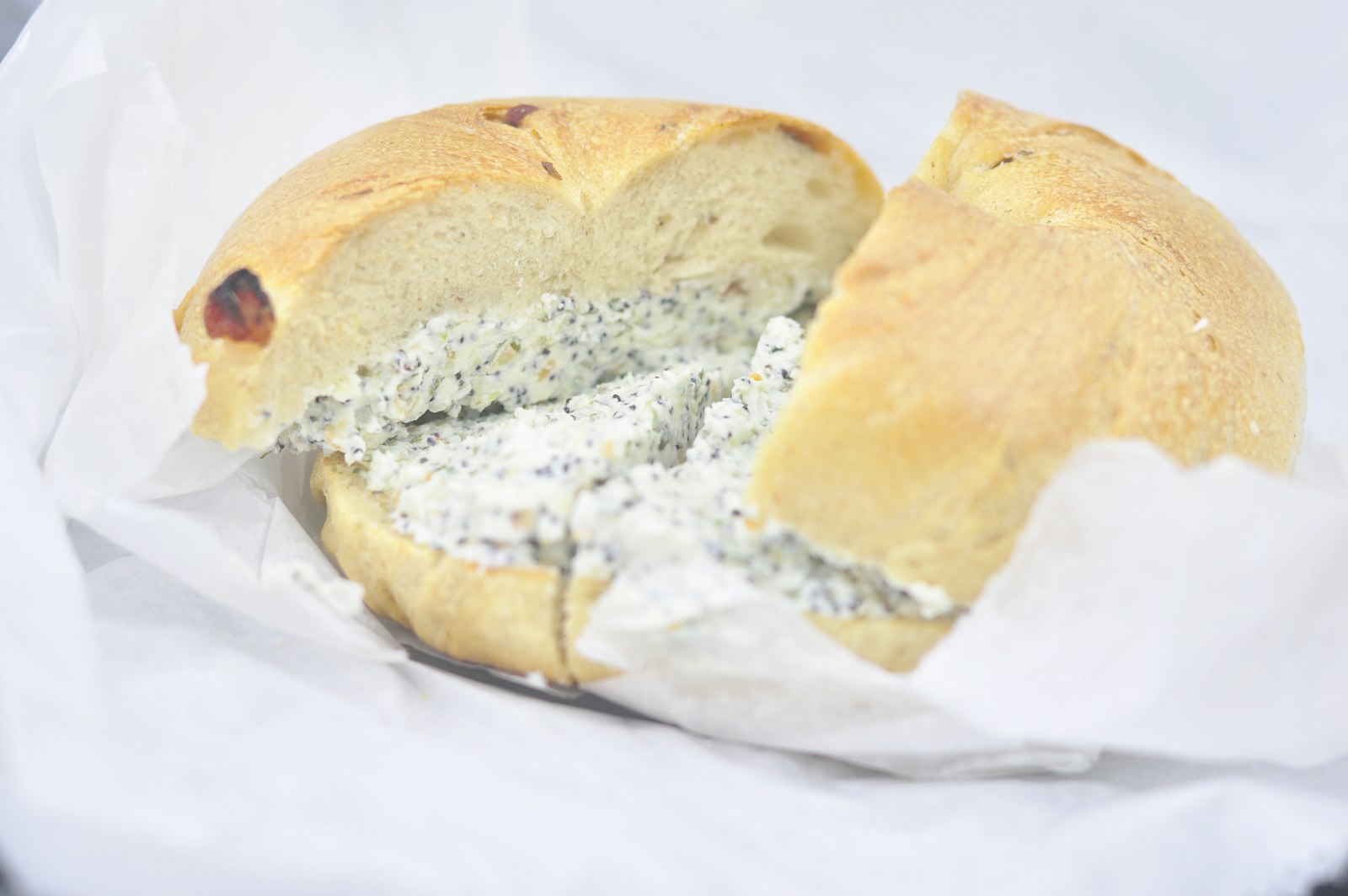 Spinach dip served in a bread bowl