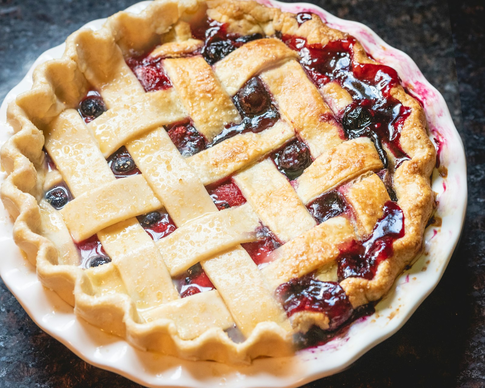 a lattice topped New England blueberry pie