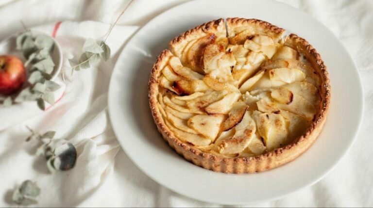 Fall desserts: rustic French apple tart on a white plate