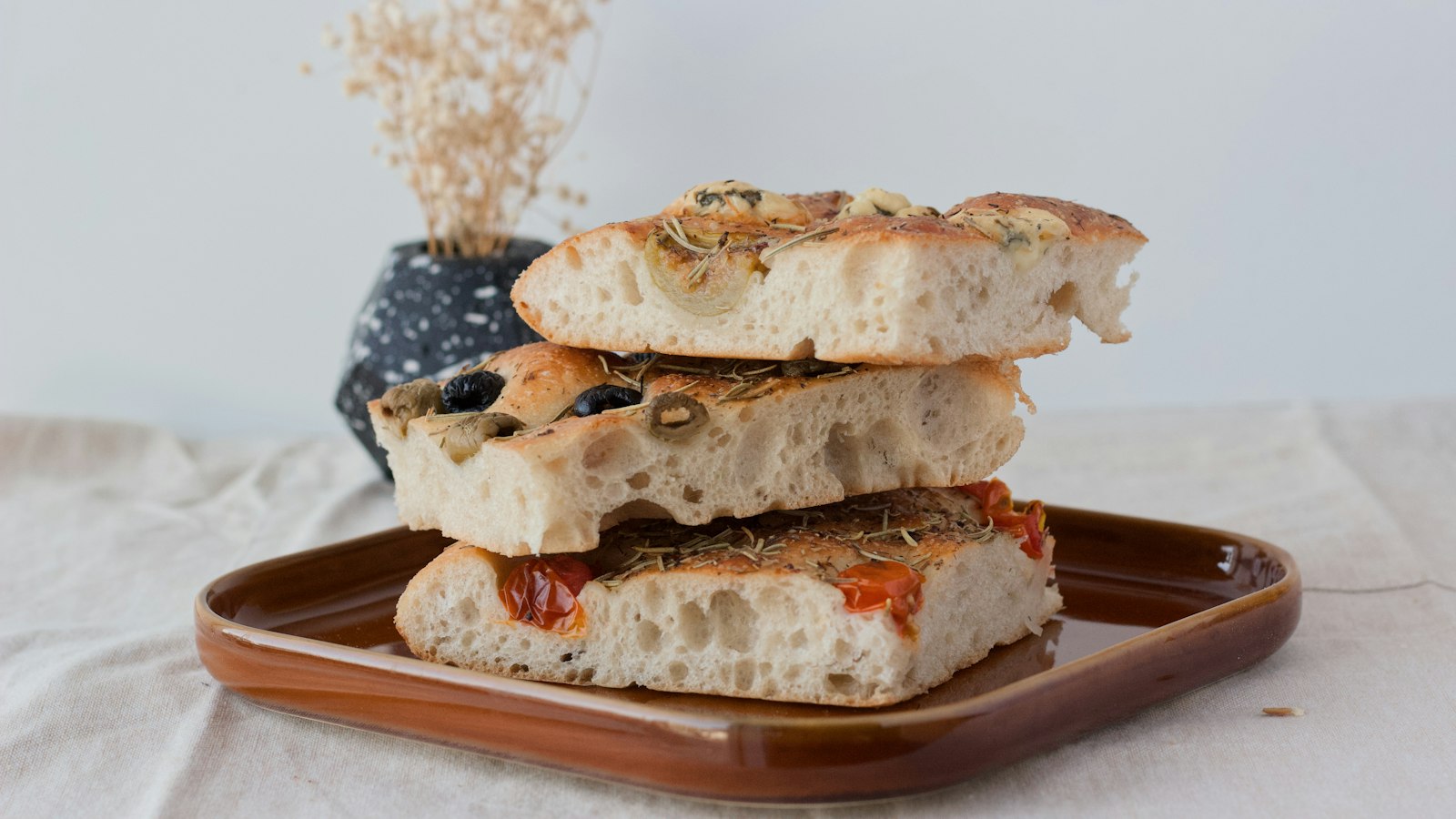 Homemade dinner rolls: stacked slices of homemade focaccia