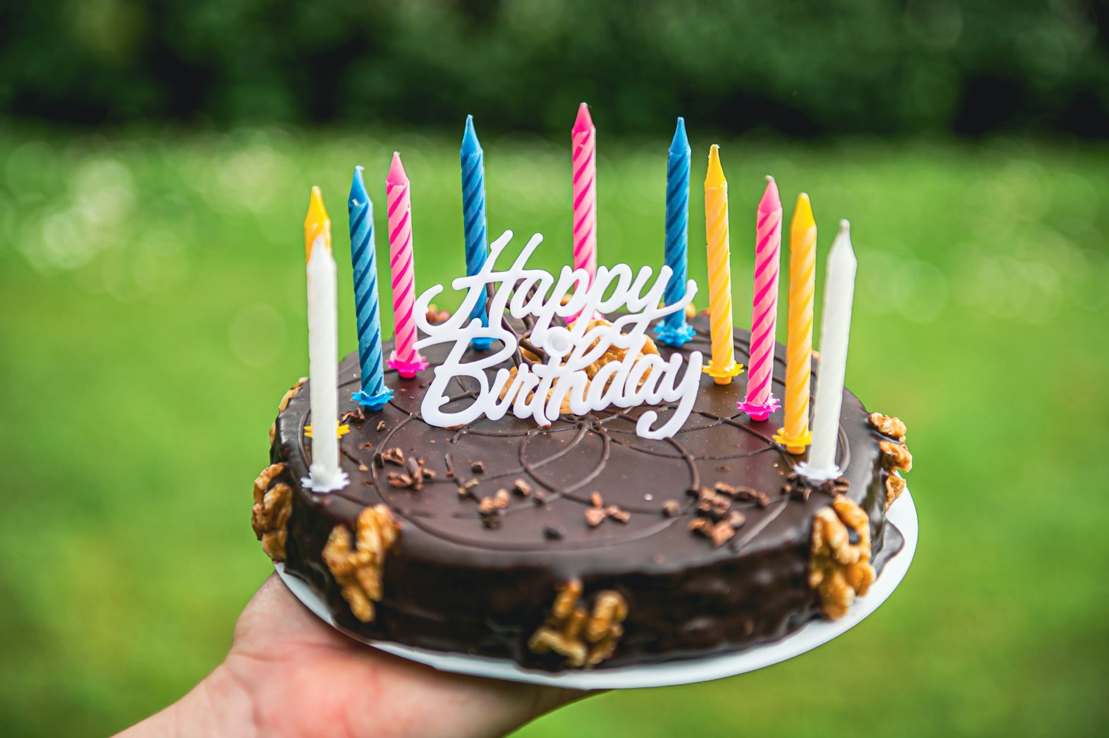 Chocolate birthday cake with candles