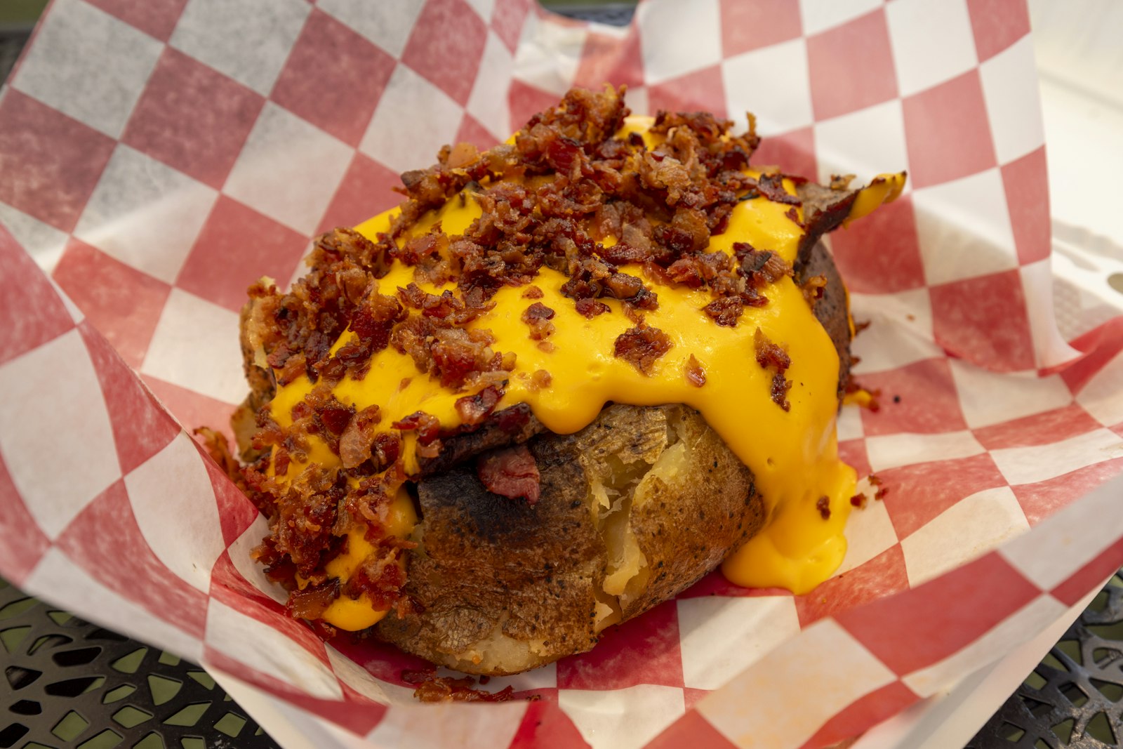 Loaded baked potato with cheese and bacon
