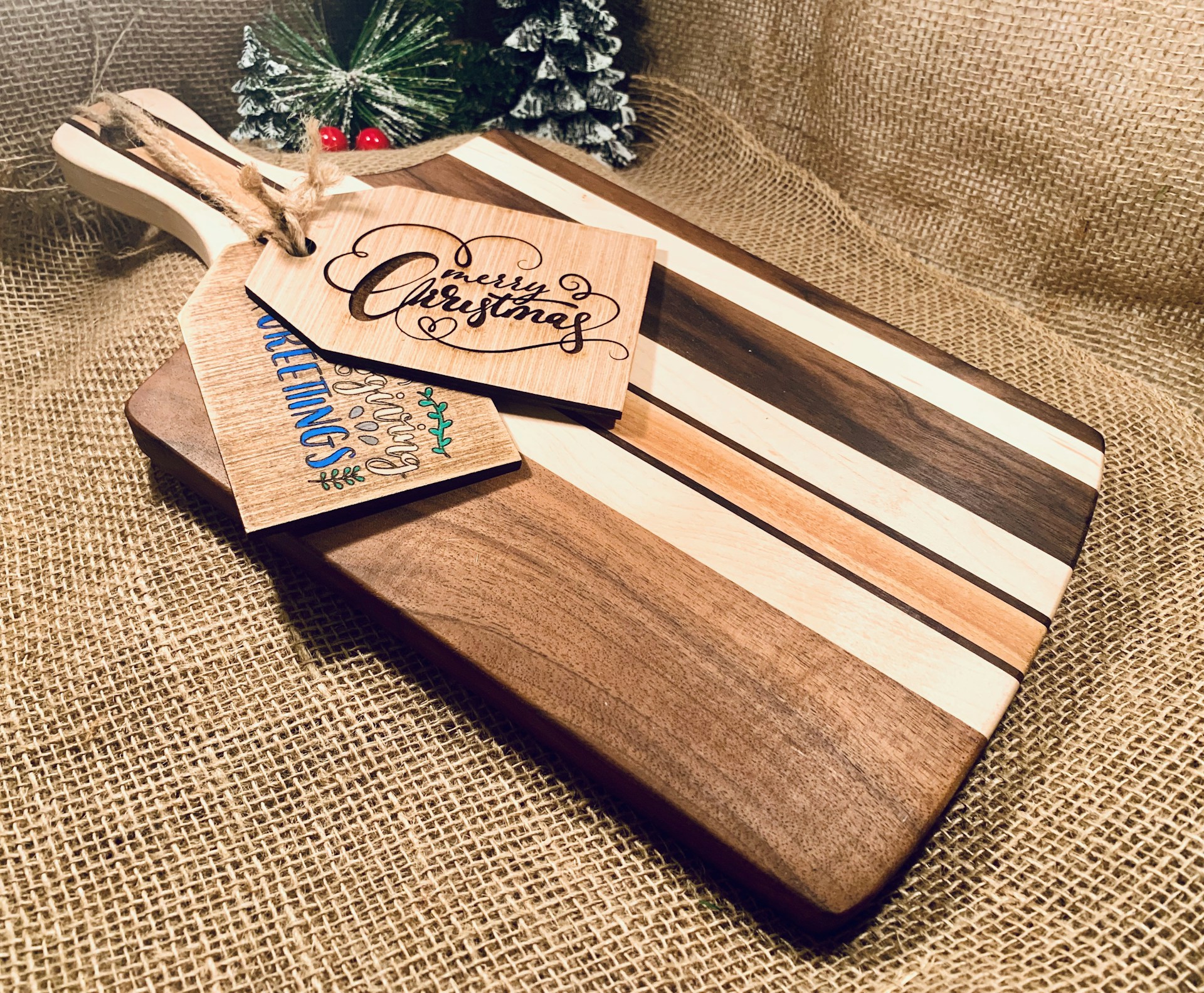 Cutting board Christmas gifts ready to sell with a hang tag on burlap