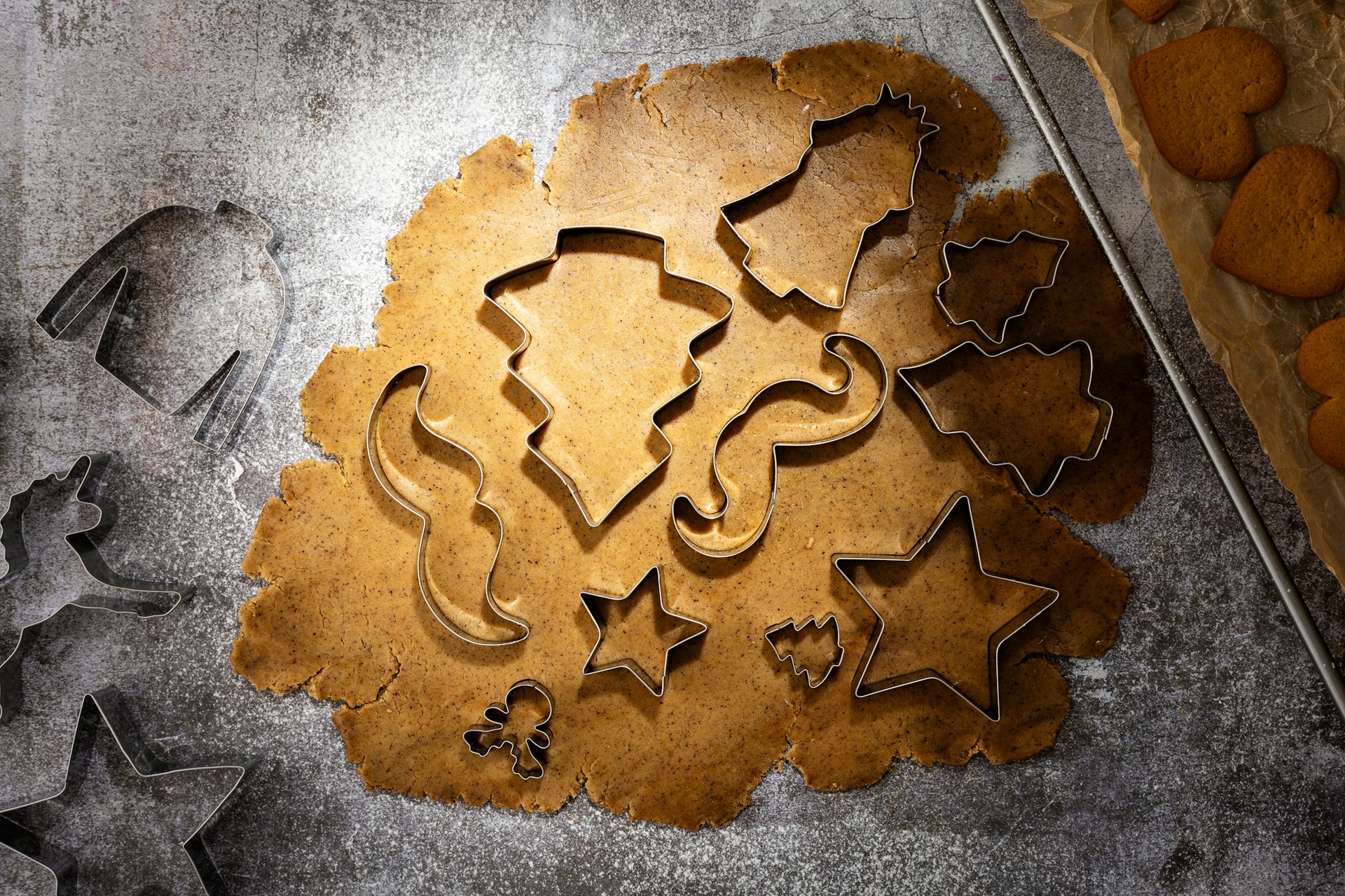 Metal Christmas cookie cutters in tree, star and gingerbread shapes