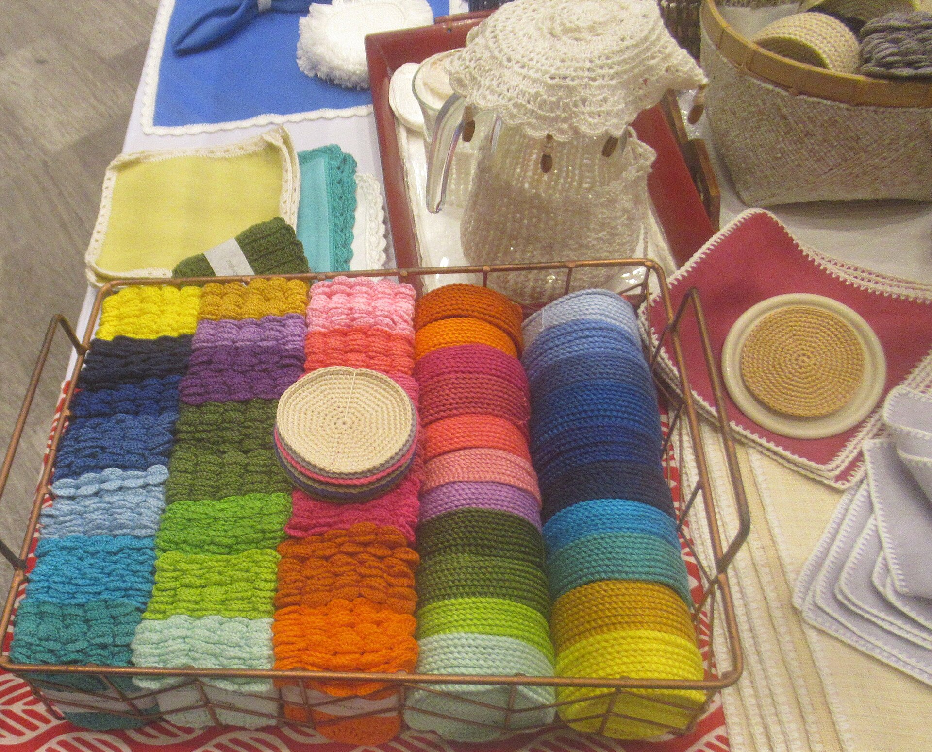 Stack of colorful handmade round coasters