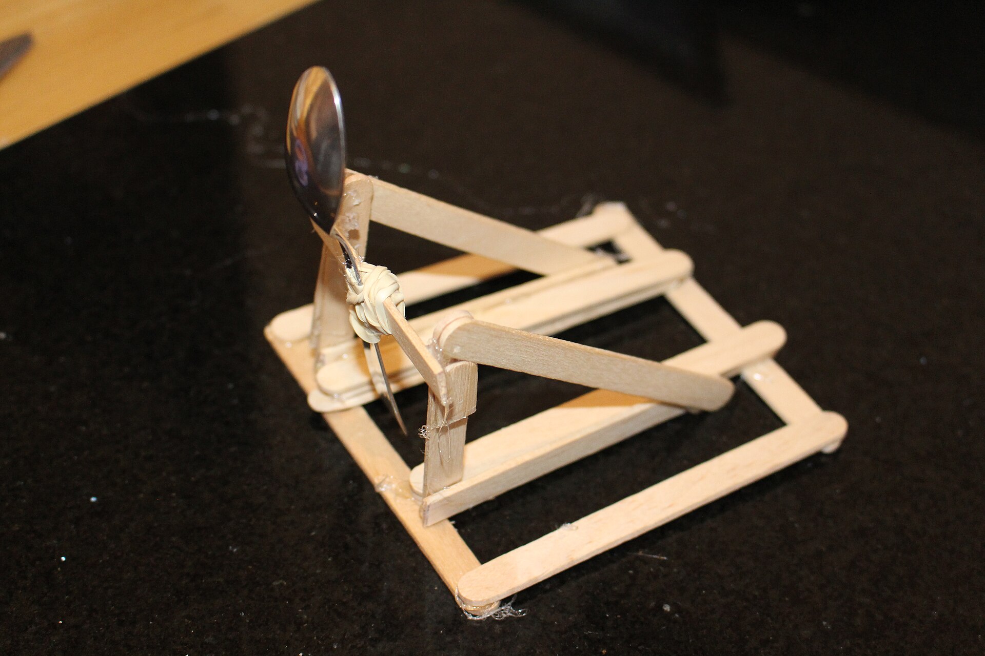 Small catapult made from wooden craft sticks
