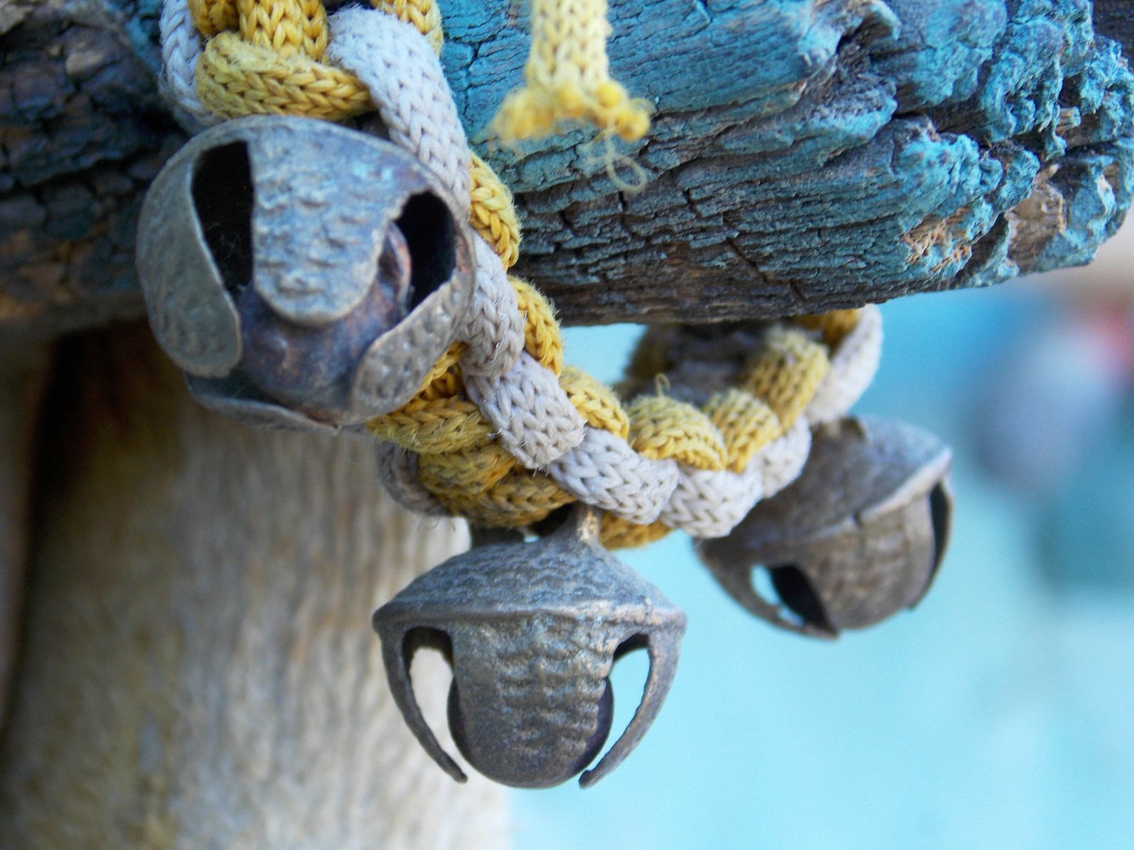 DIY Christmas garland idea: metal jingle bells tied on a braided cord