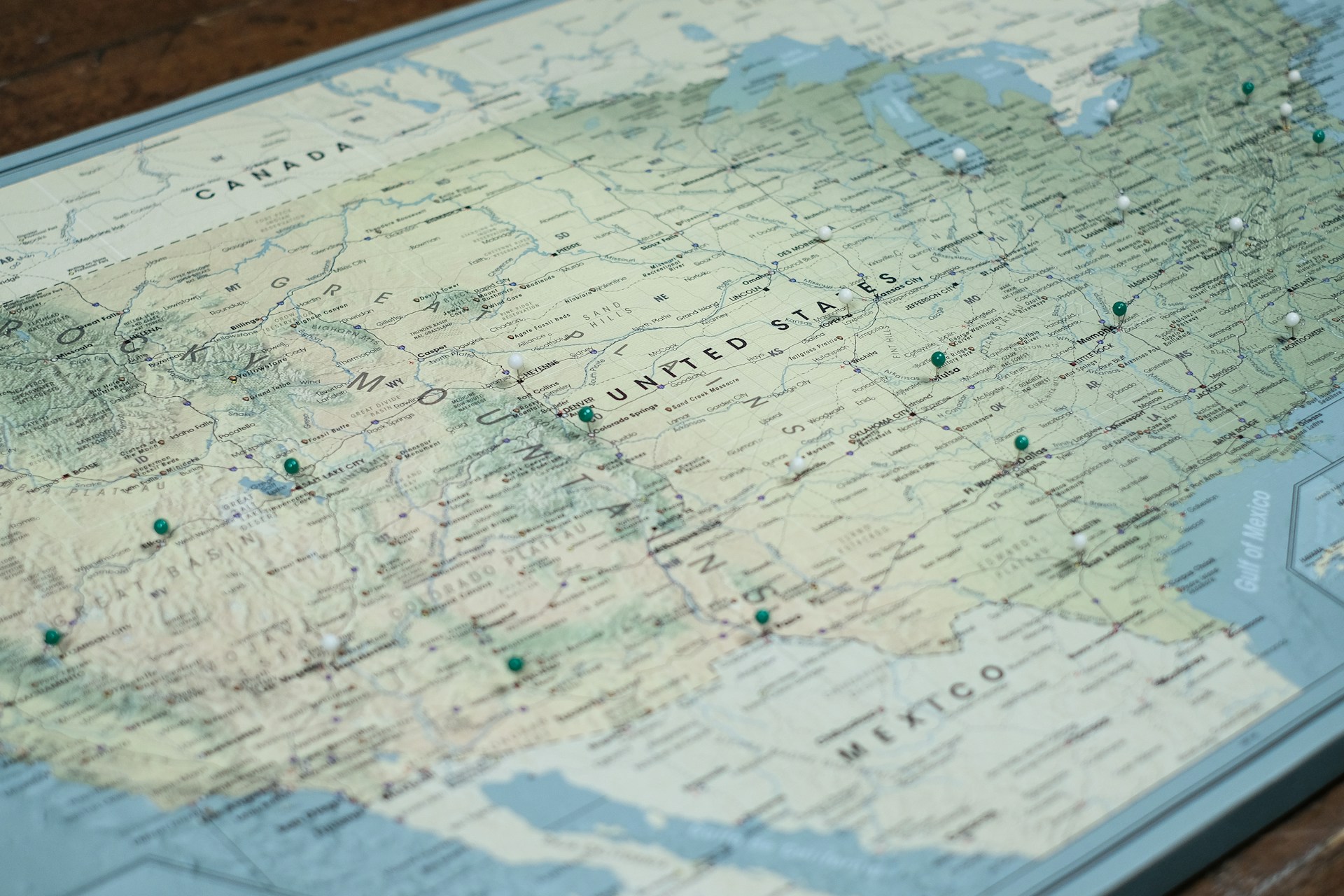 Old paper map on a wooden table