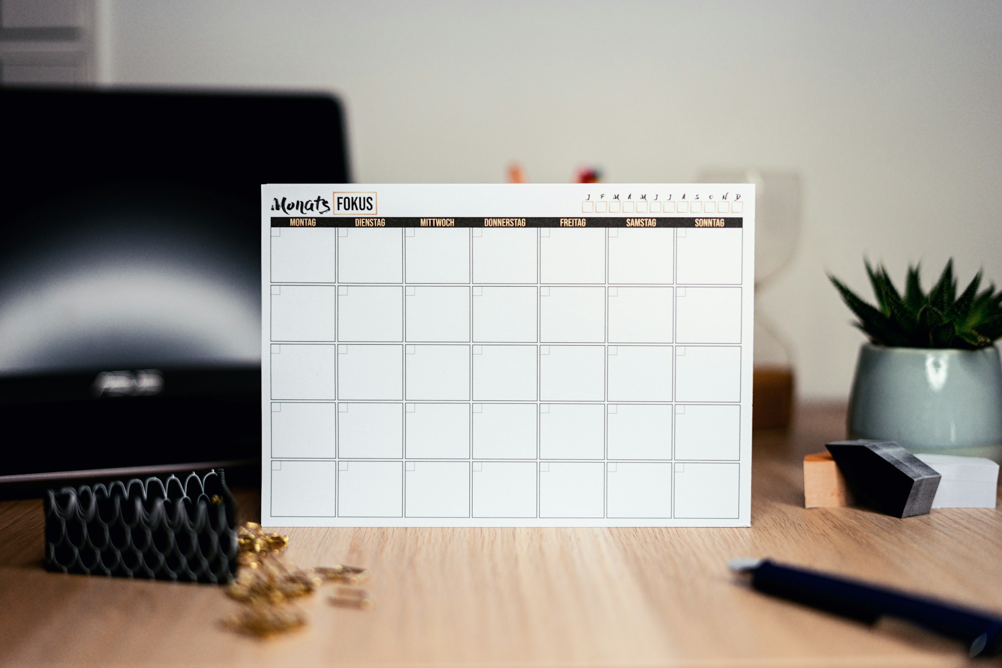 Brilliant organizing ideas: a dry erase monthly calendar on a desk for a family command center