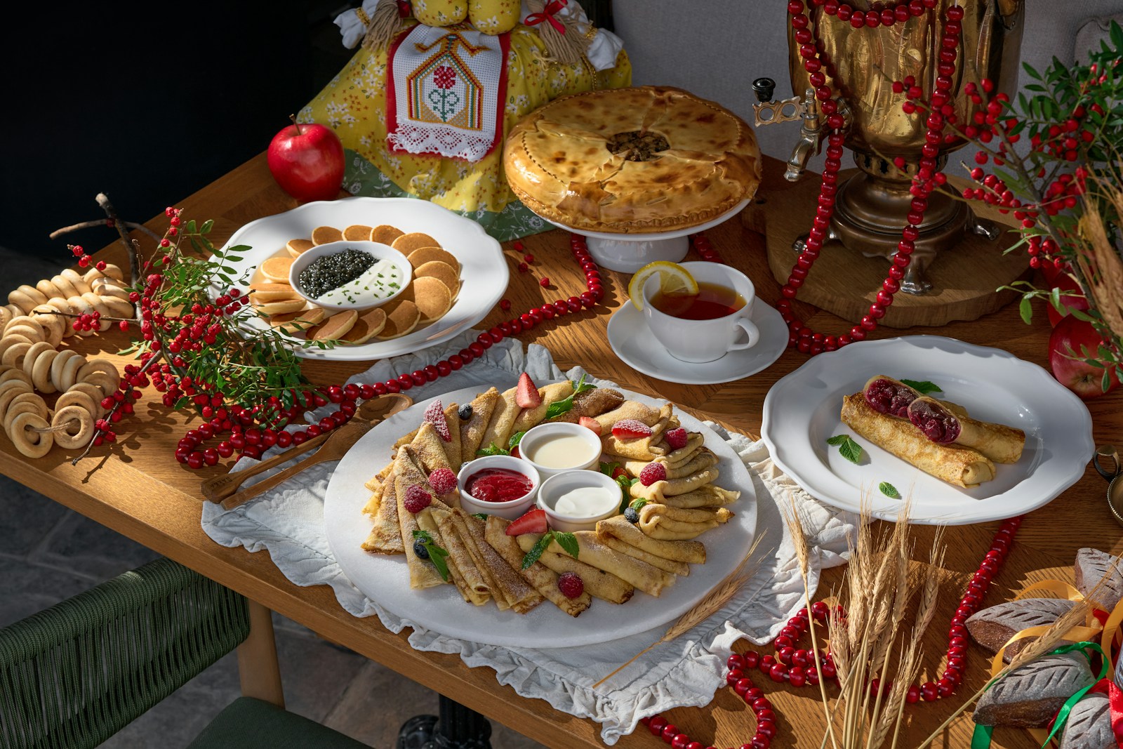 Festive holiday buffet spread with plates and decorations