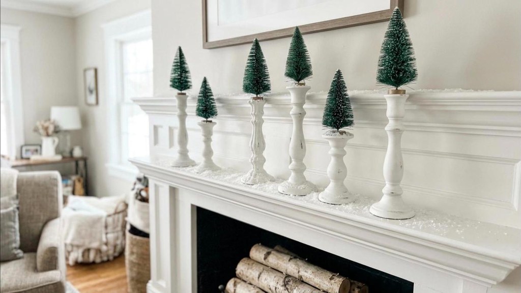 Mismatched thrift candlesticks painted white with mini bottle brush trees glued on top
