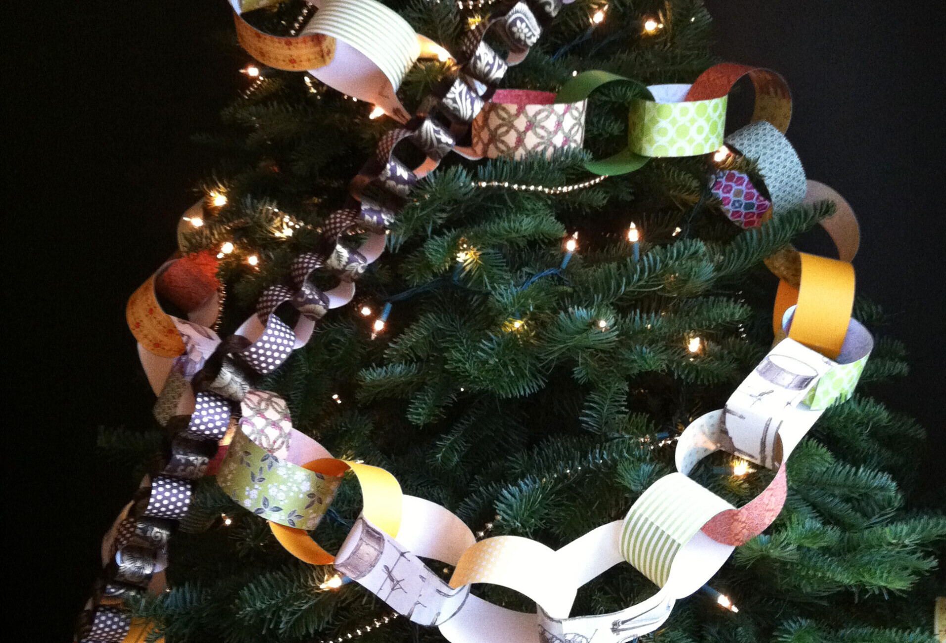 Hans Christian Andersen style Christmas tree decorated with colorful patterned paper chains