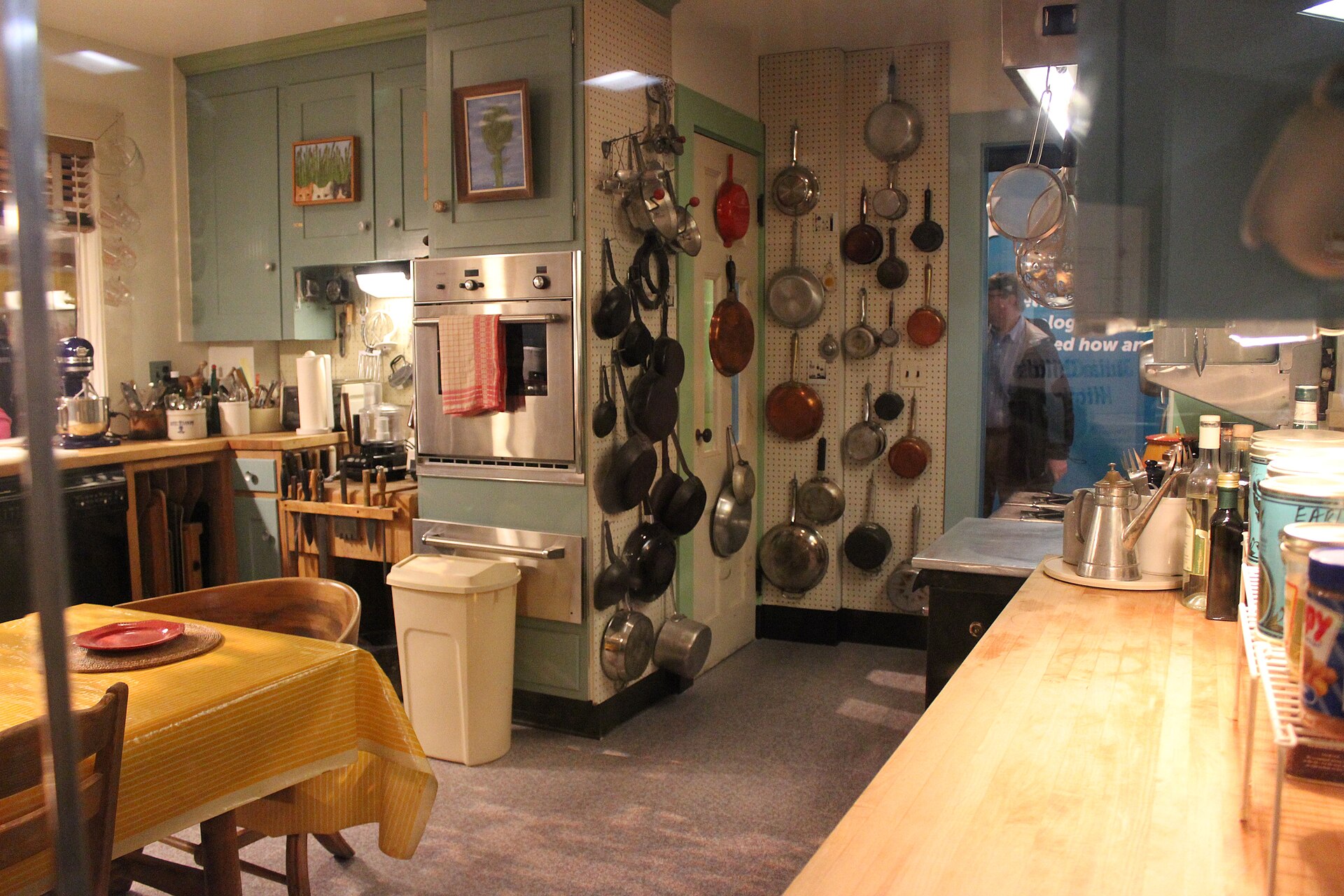 Julia Child Kitchen at the Smithsonian with a pegboard wall full of pots and pans